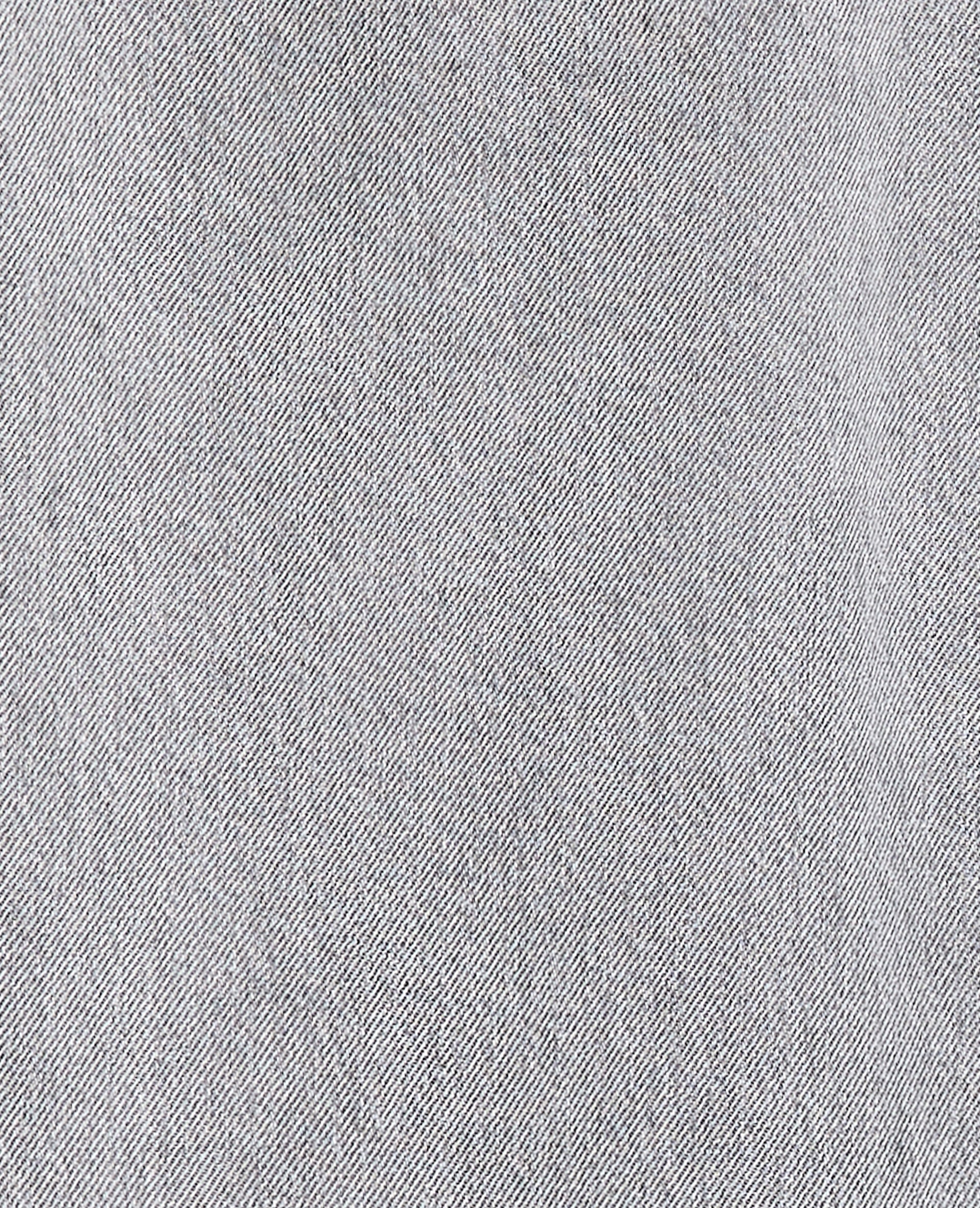 Jean baggy taille basse avec ceinture à nouer
