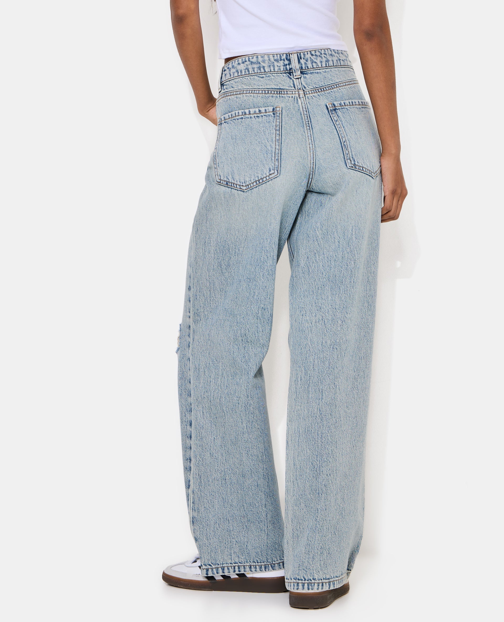 Jean wide taille basse avec trous genoux