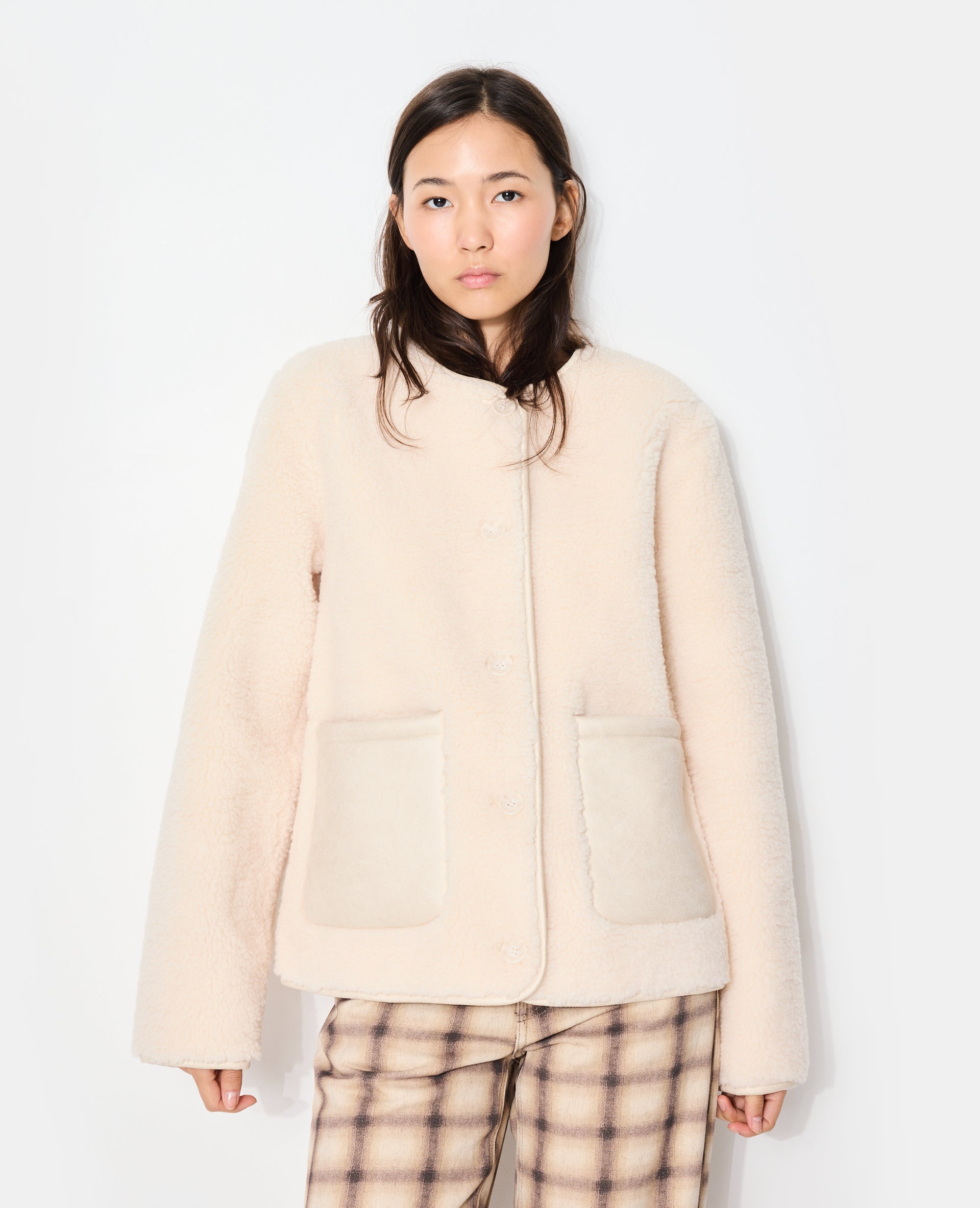 Blouson en sherpa façon peau lainée