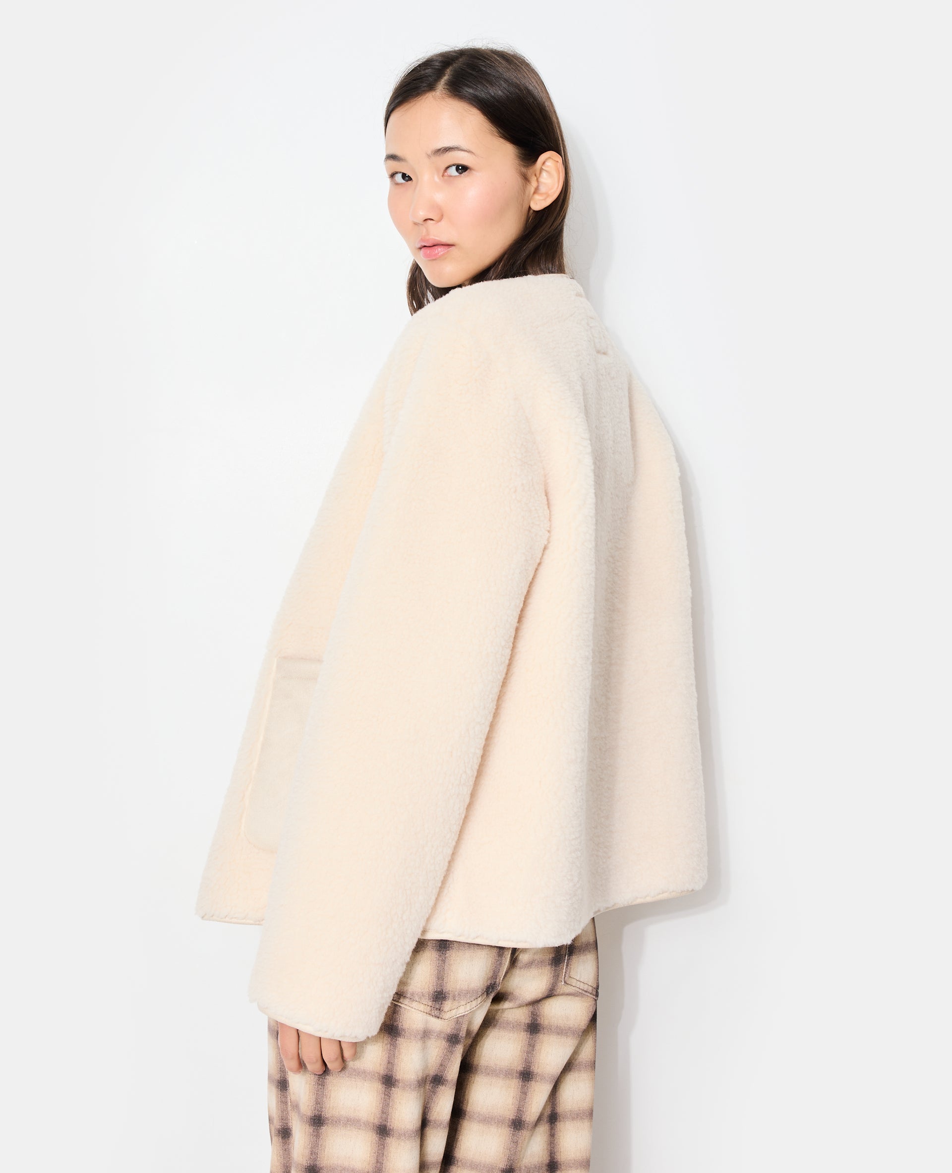 Blouson en sherpa façon peau lainée