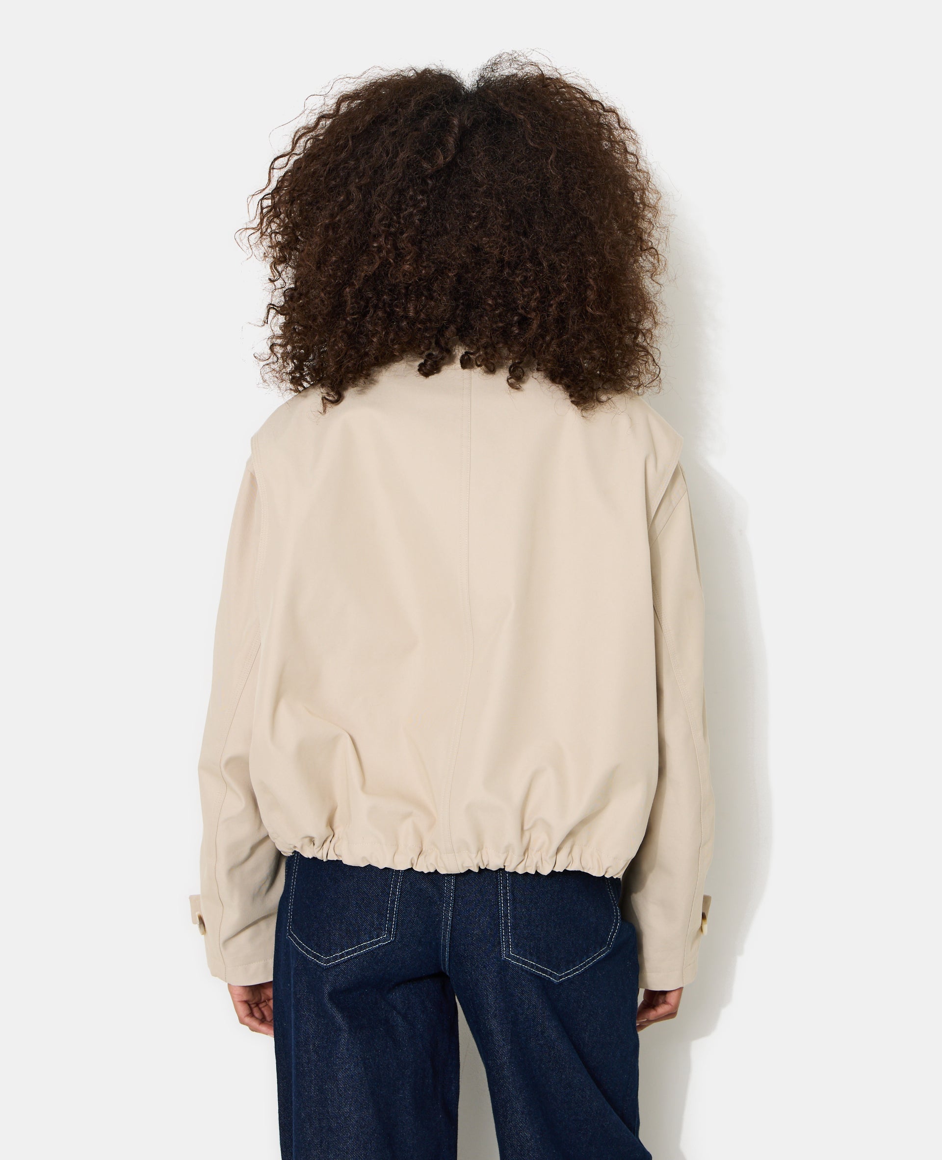 Veste col simili avec base resserrable