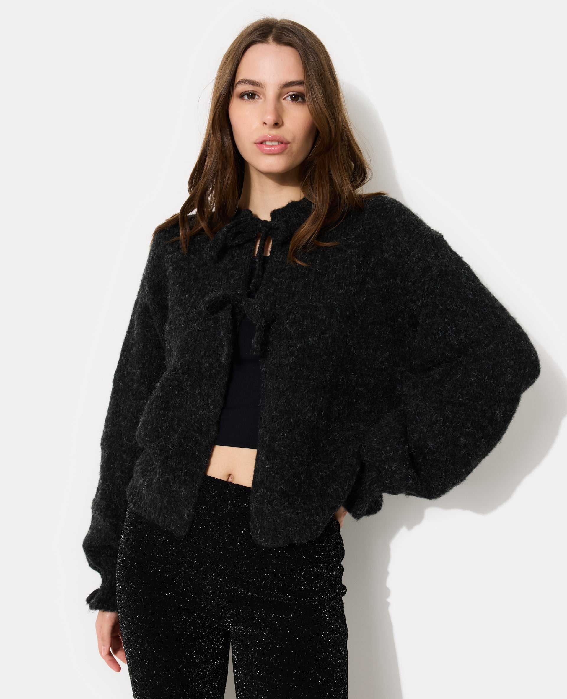 Gilet en maille fantaisie avec nouettes et volants