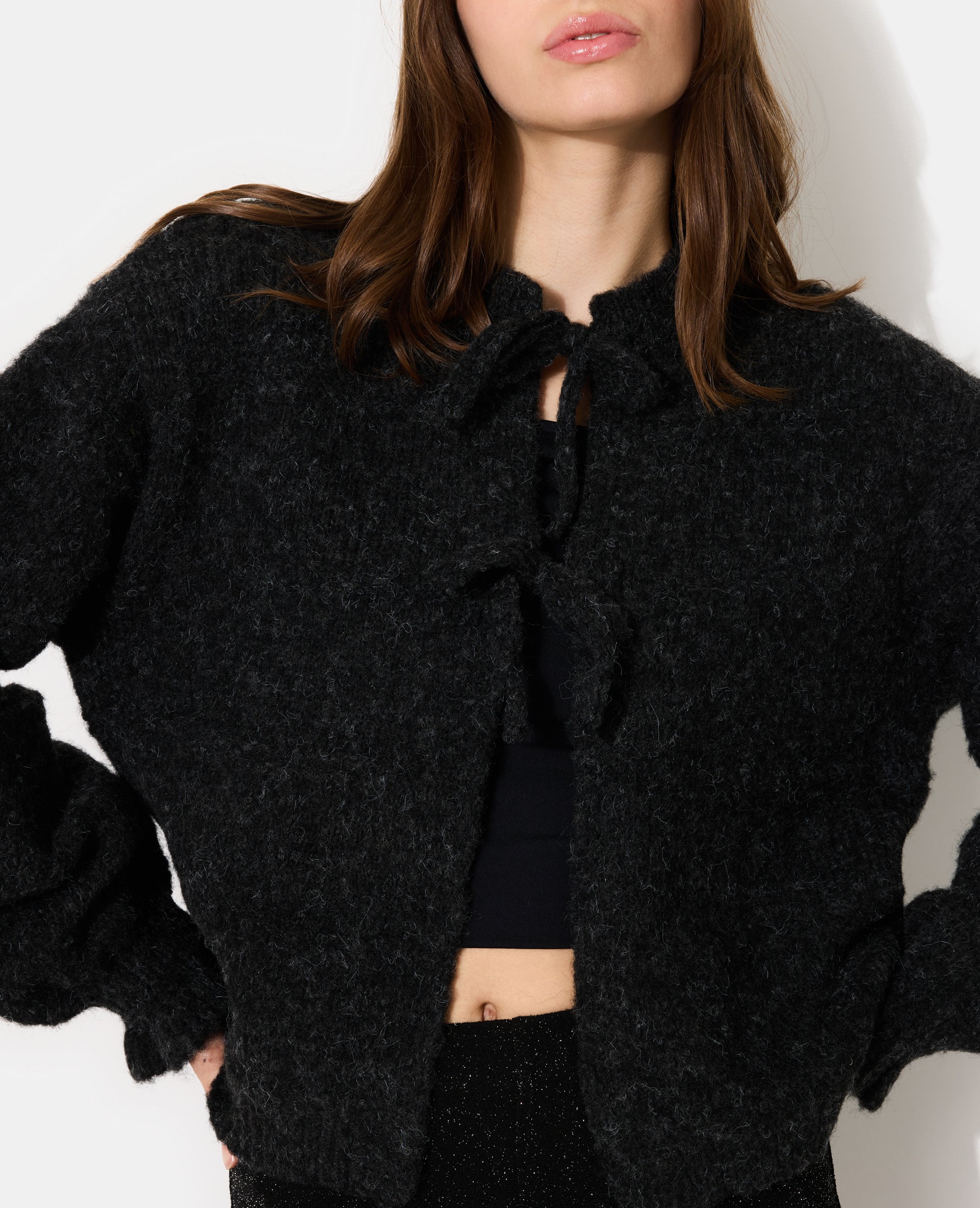 Gilet en maille fantaisie avec nouettes et volants