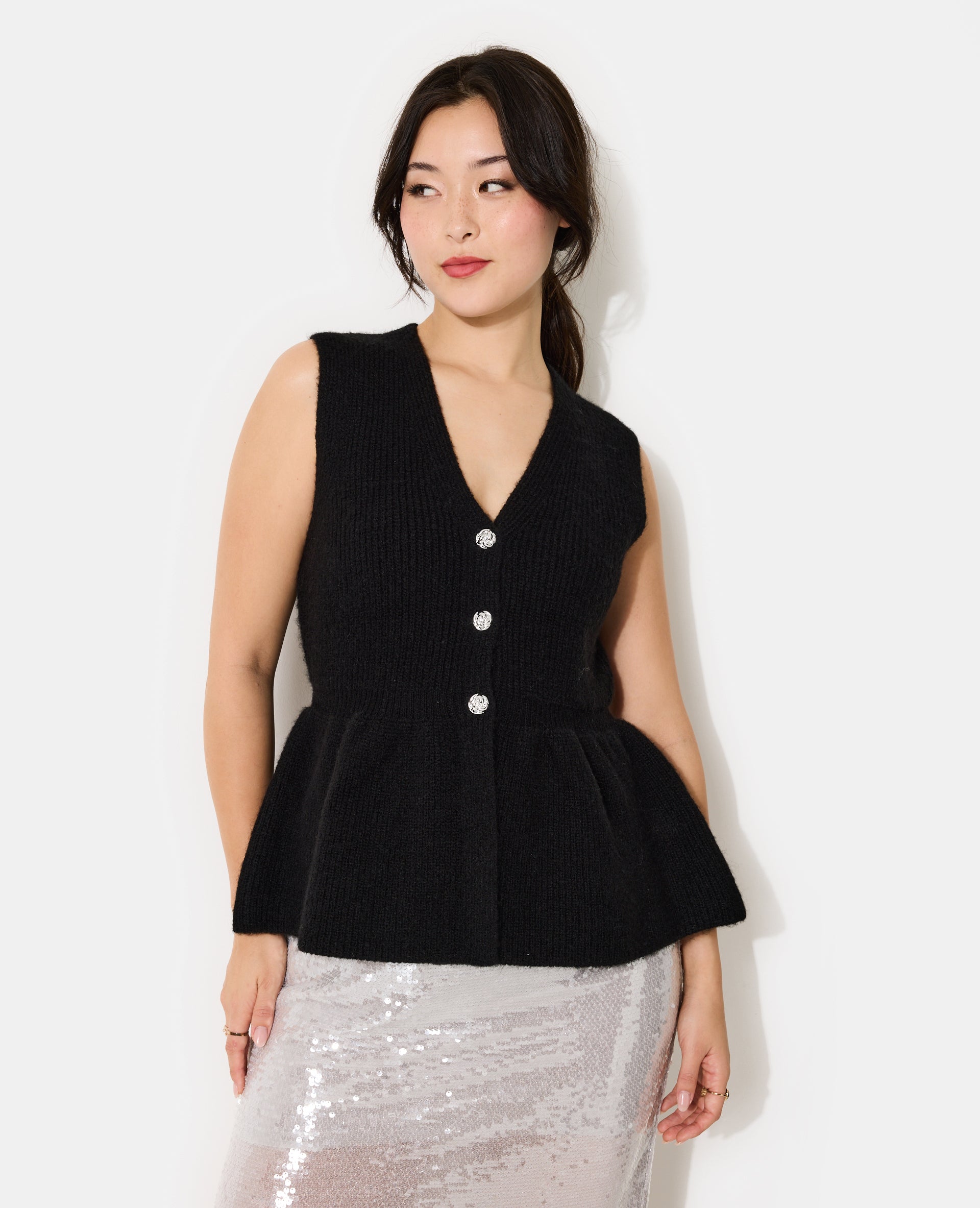 Gilet sans manches forme peplum