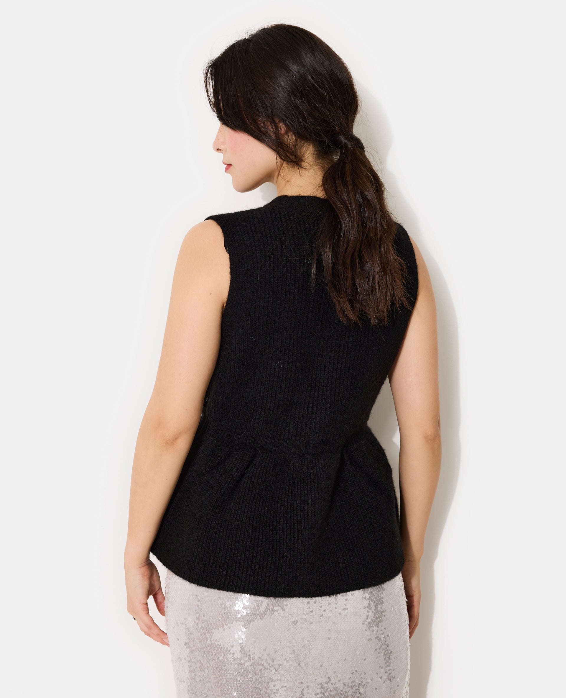 Gilet sans manches forme peplum