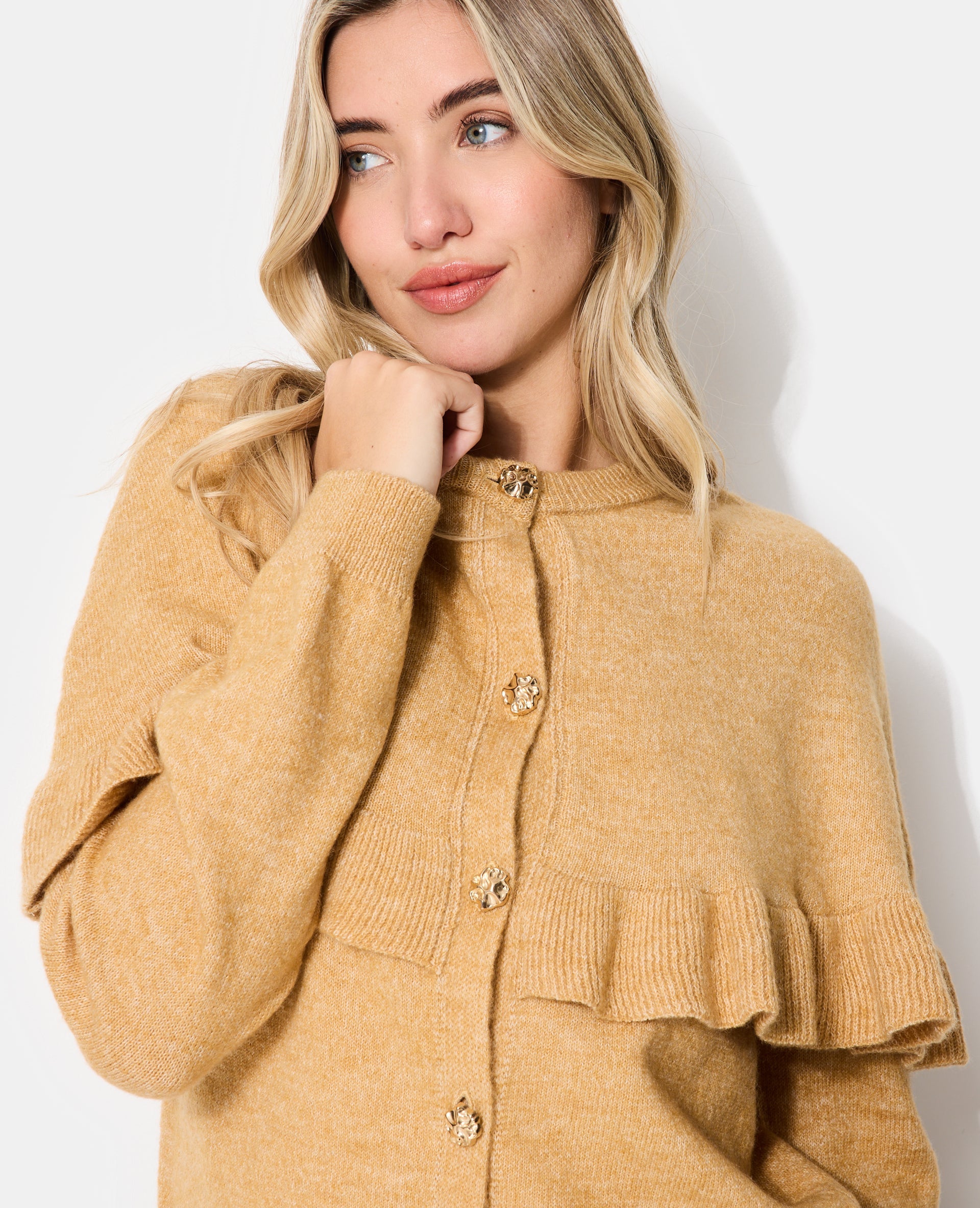 Gilet avec cape et boutons fantaisie