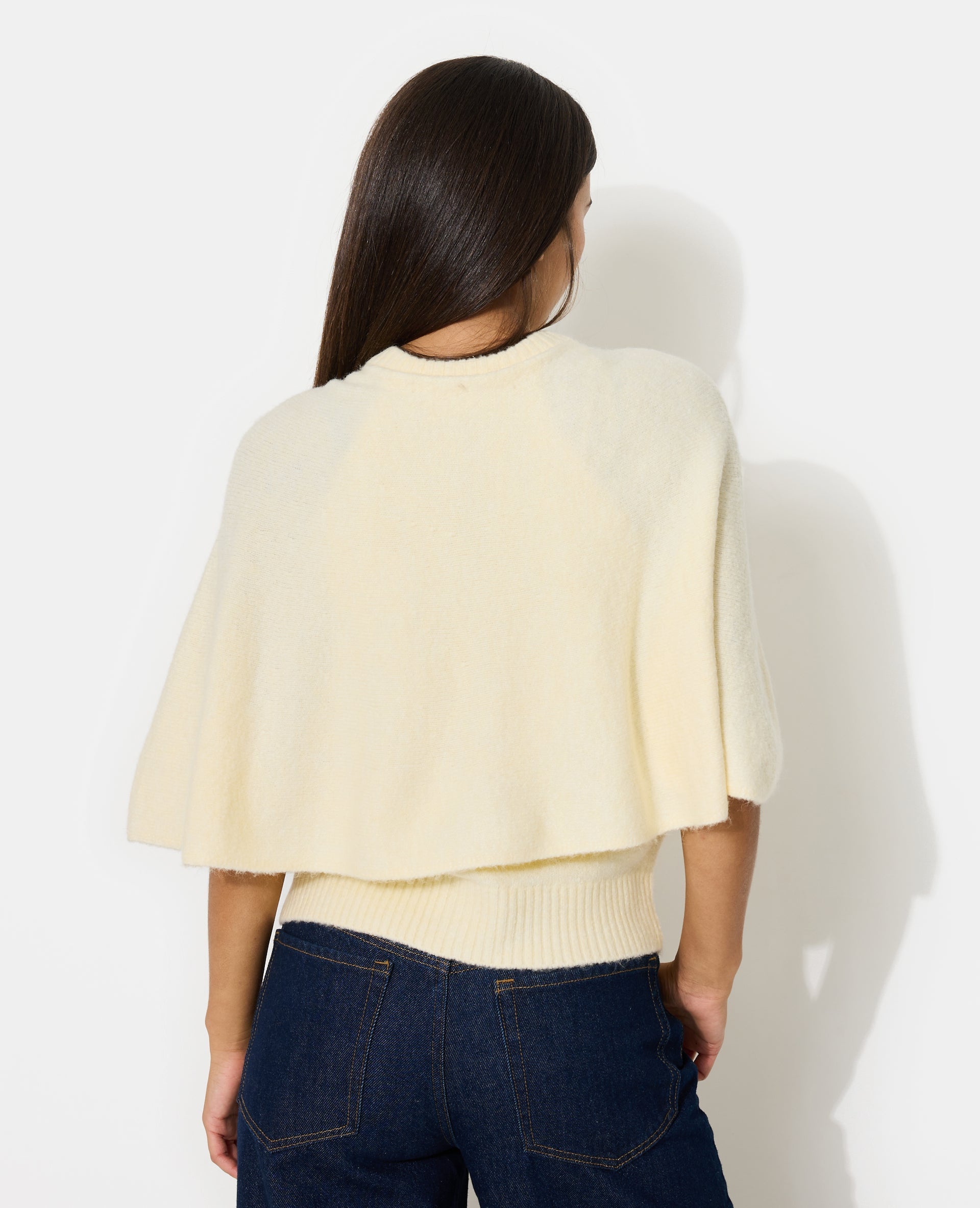 Gilet cape avec boutons
