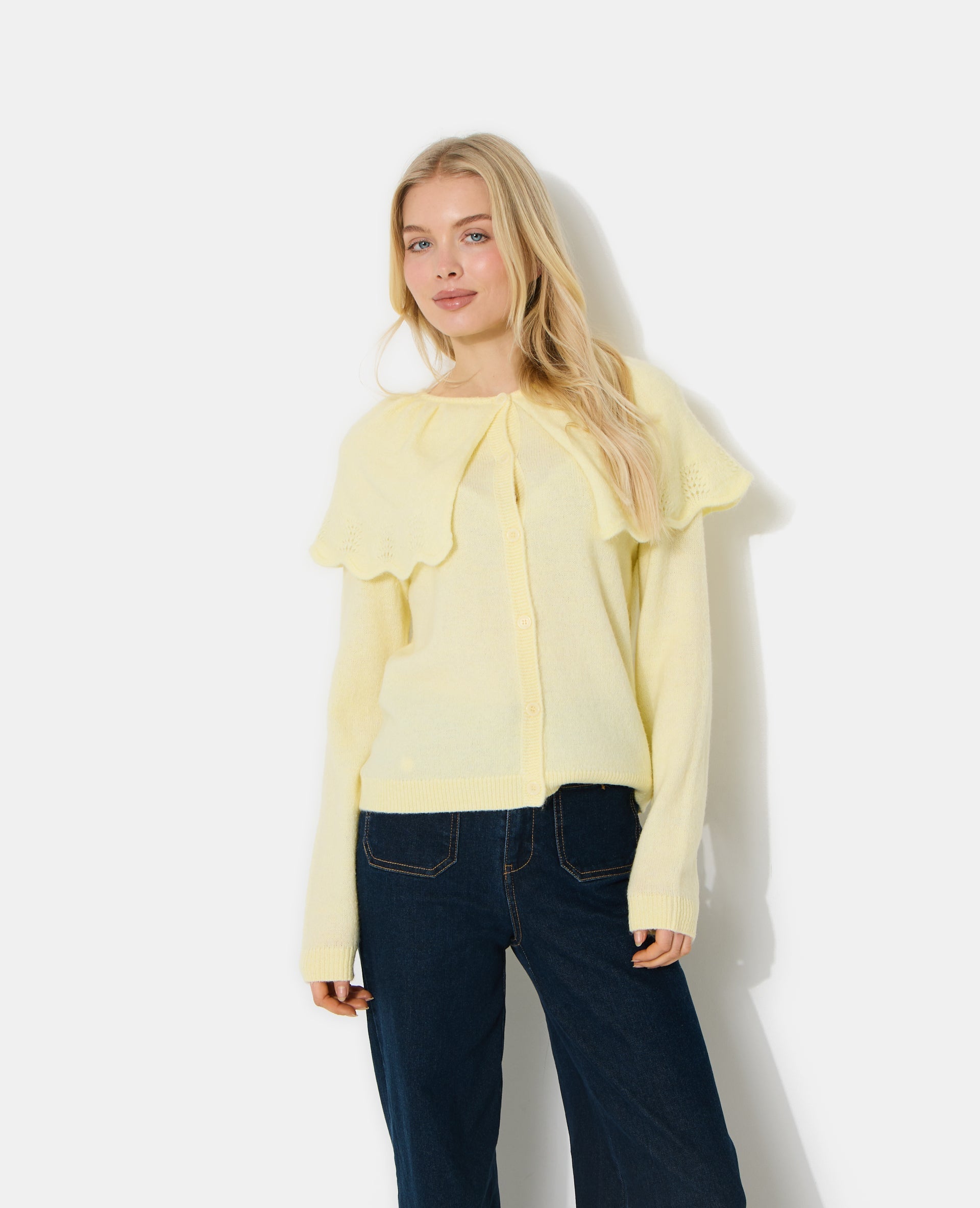 Gilet avec cape en maille ajourée