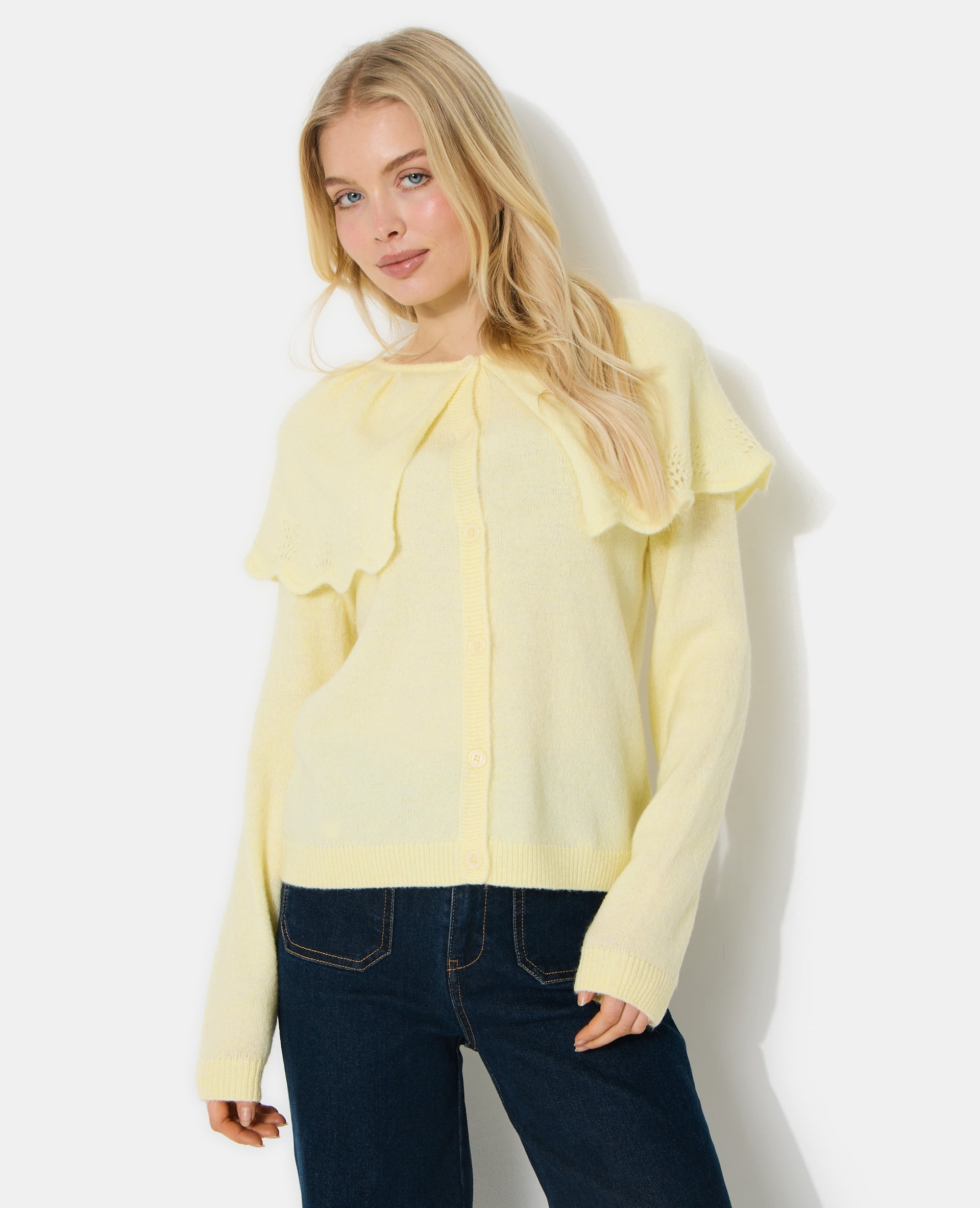 Gilet avec cape en maille ajourée