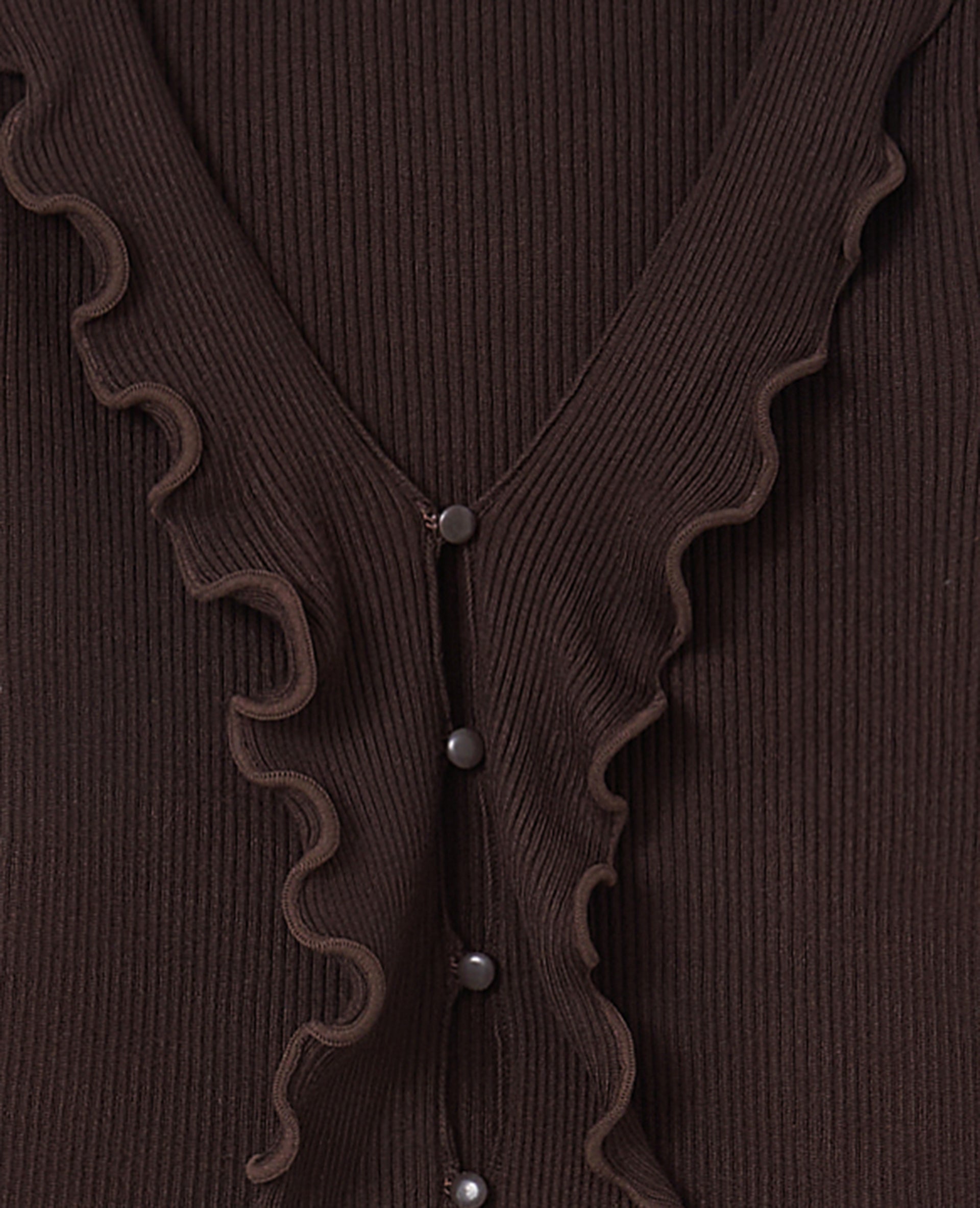 Gilet maille côtelée avec volants et bords ondulés