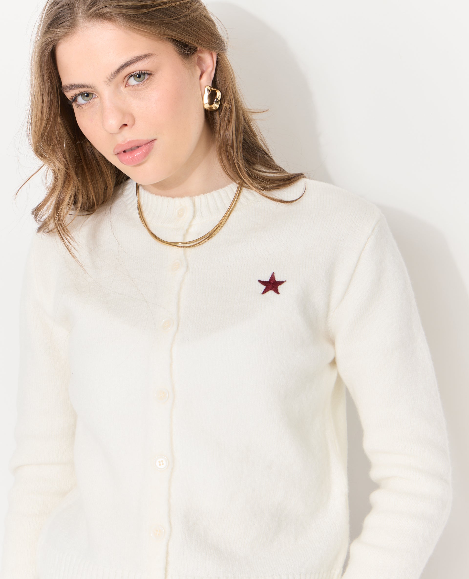 Gilet col rond avec étoile brodée