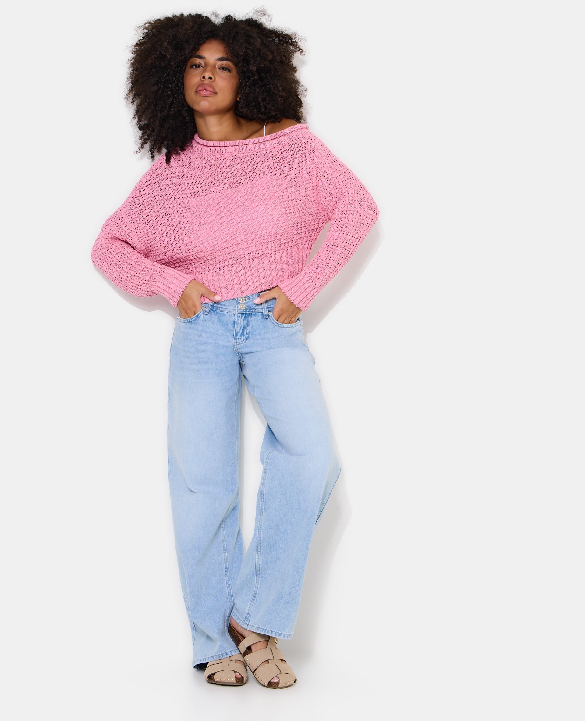 Pull asymétrique en maille ajourée