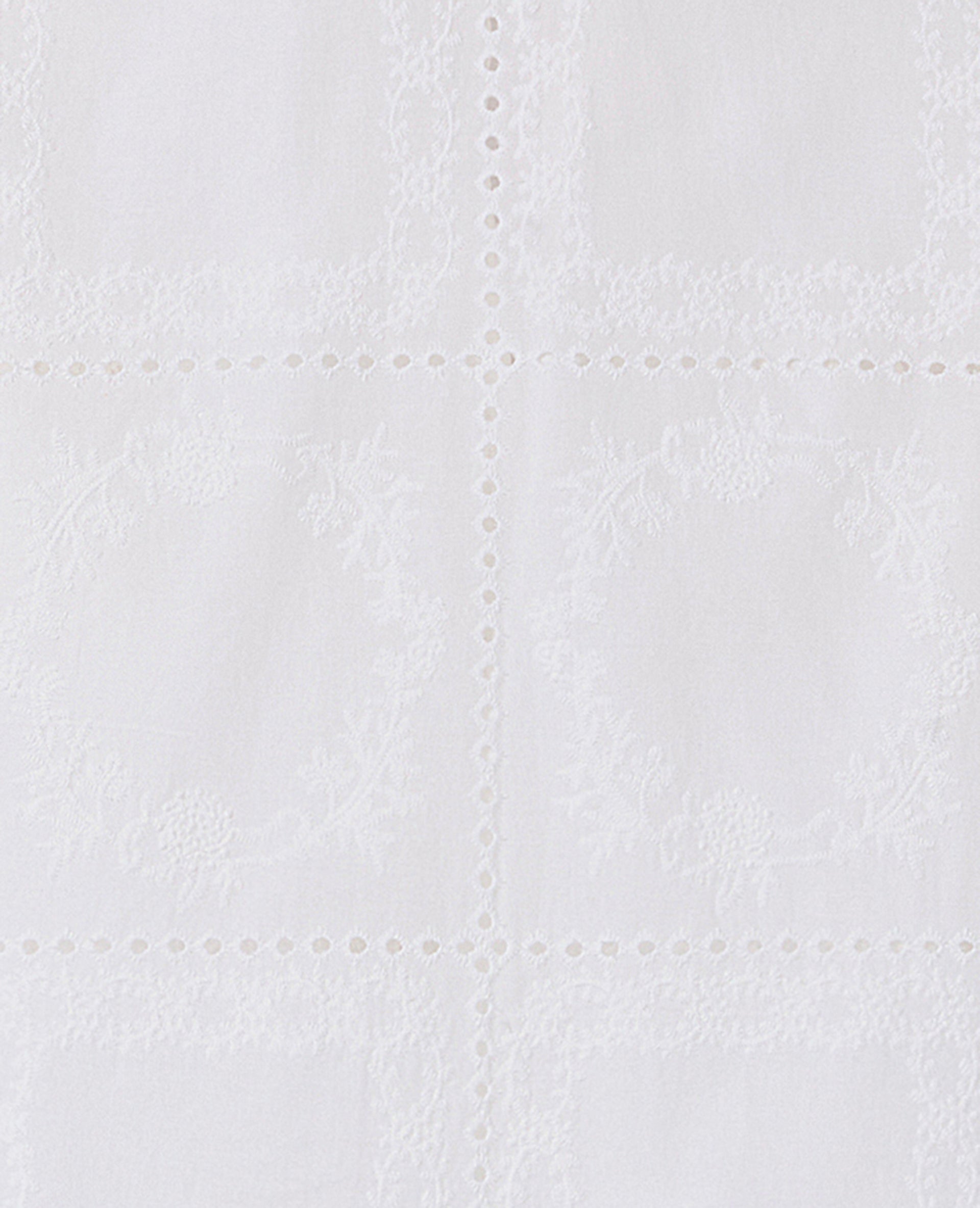 Blouse avec détails ajourés et broderies