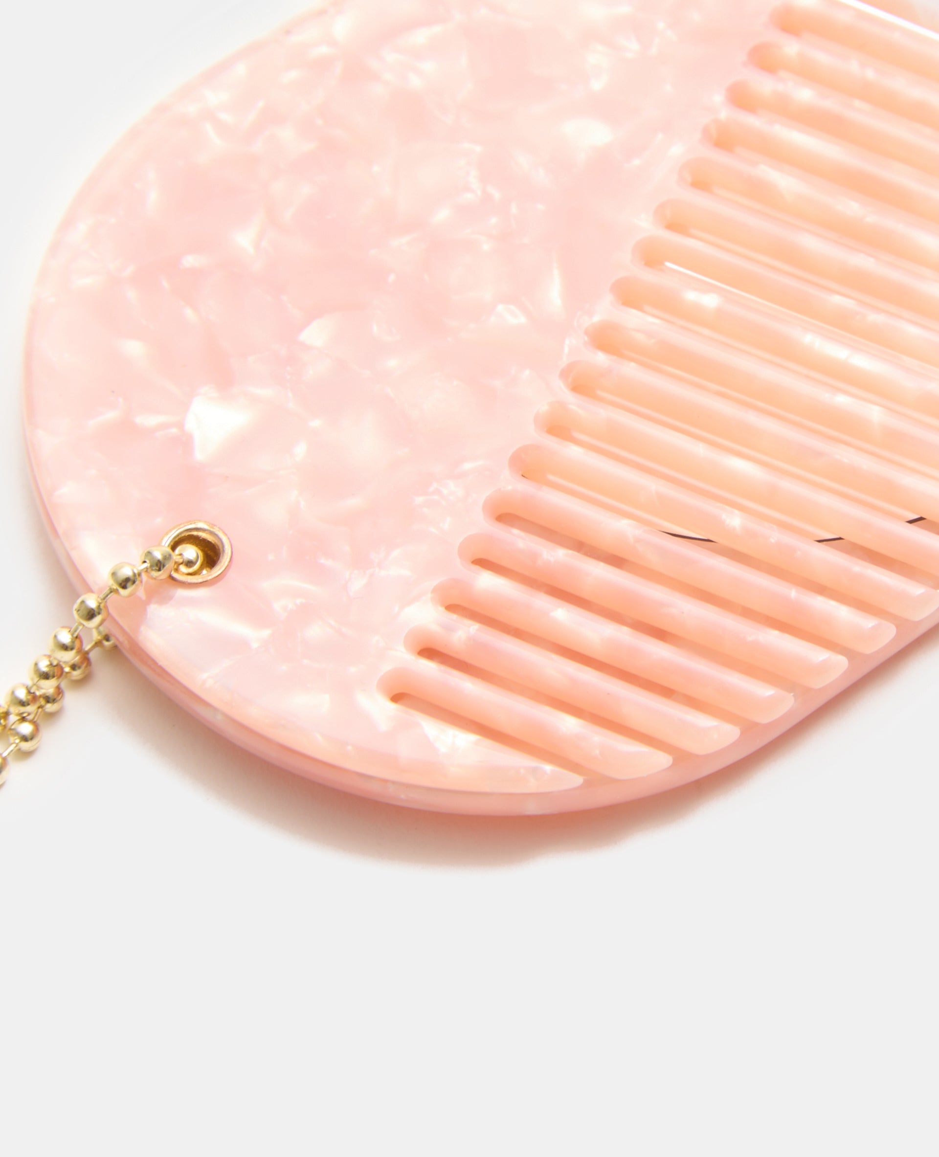 Déco de sac avec peigne et miroir