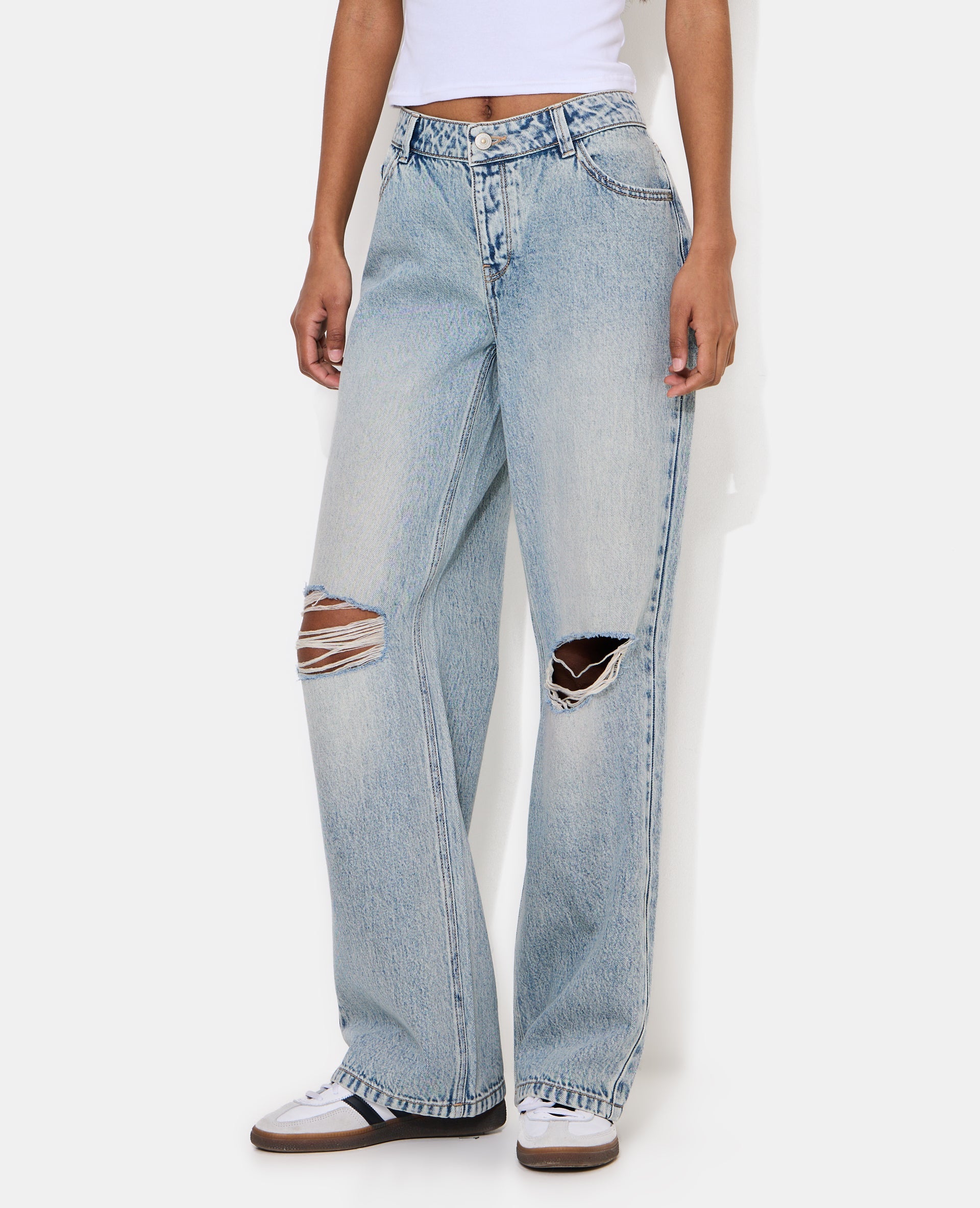 Jean wide taille basse avec trous genoux