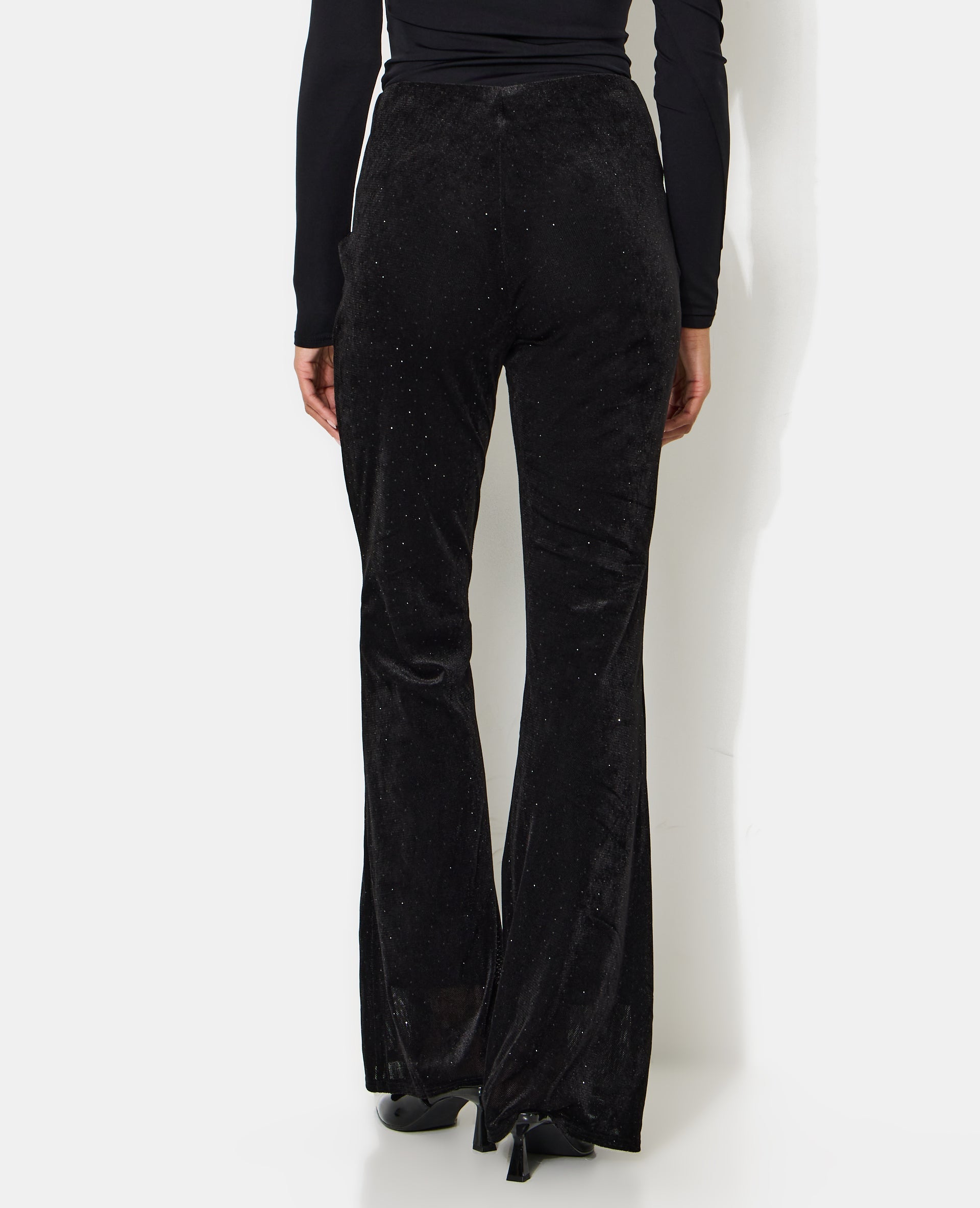 Pantalon flare en résille et velours avec strass