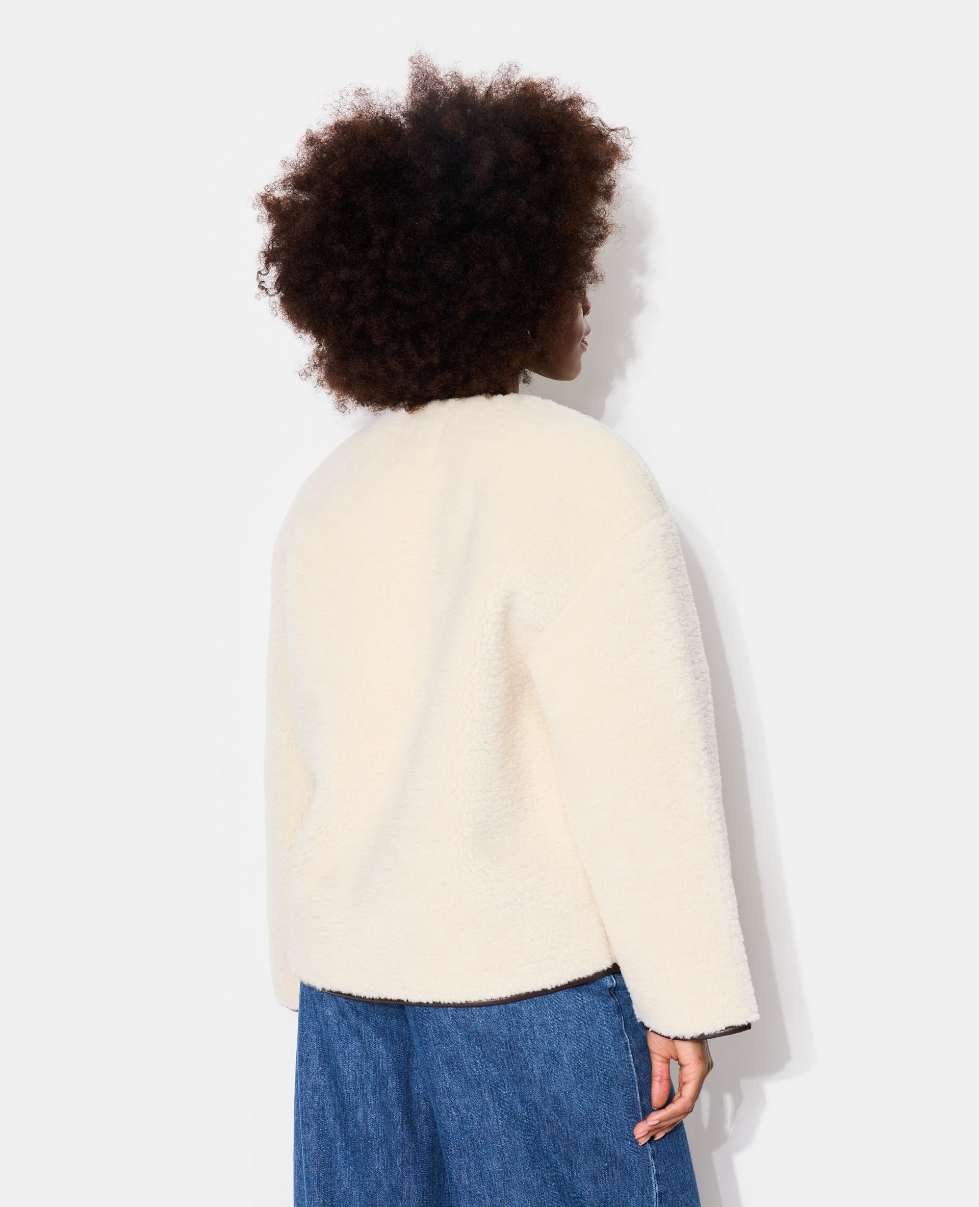 Blouson droit en sherpa avec attaches mousqueton