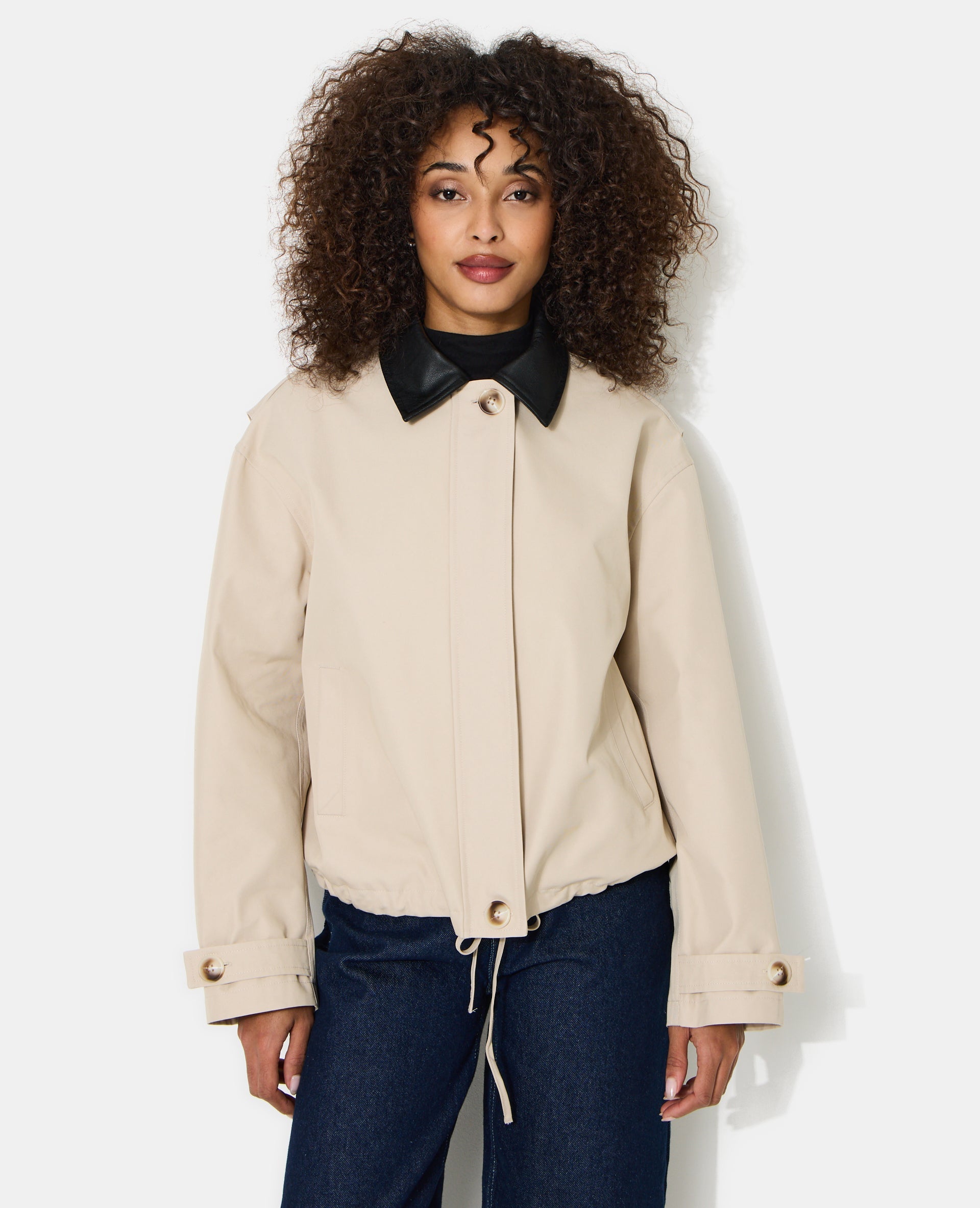 Veste col simili avec base resserrable