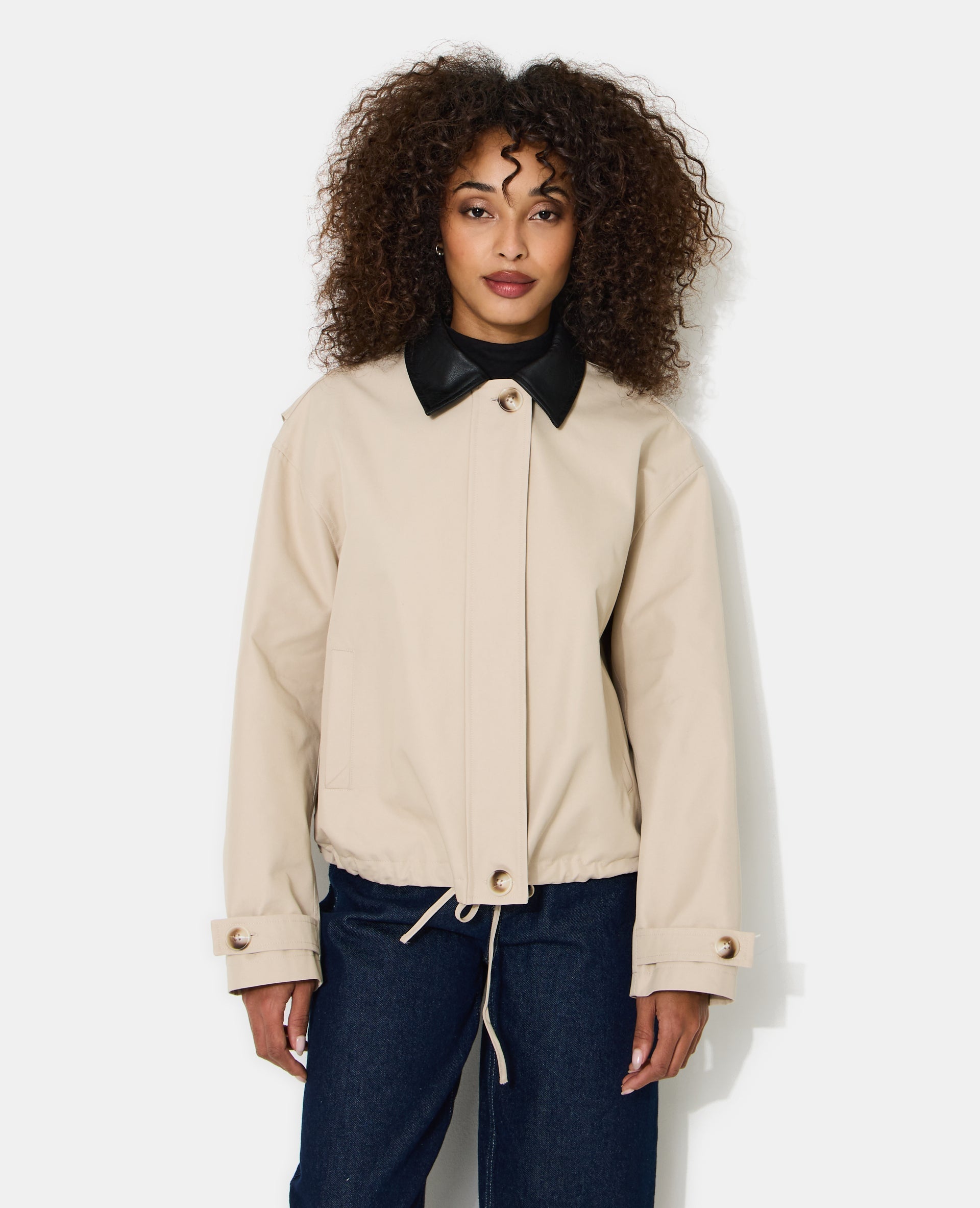 Veste col simili avec base resserrable