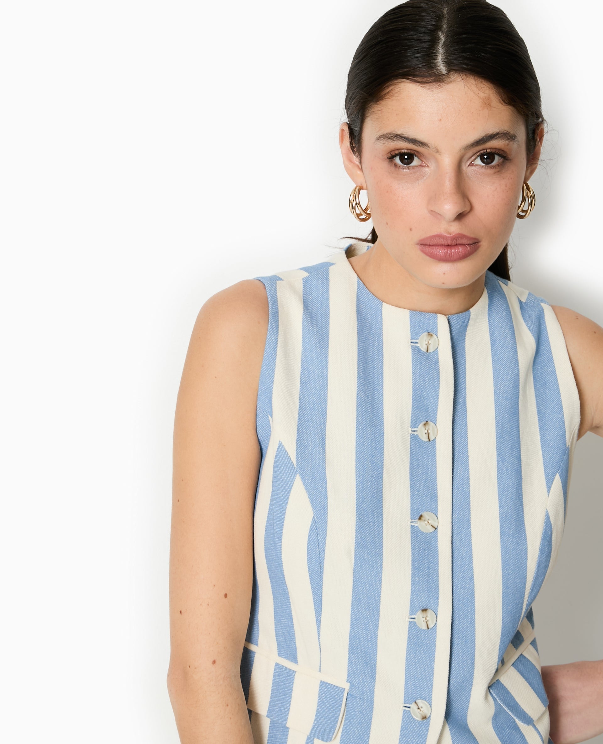 Veste longue sans manche avec rayures