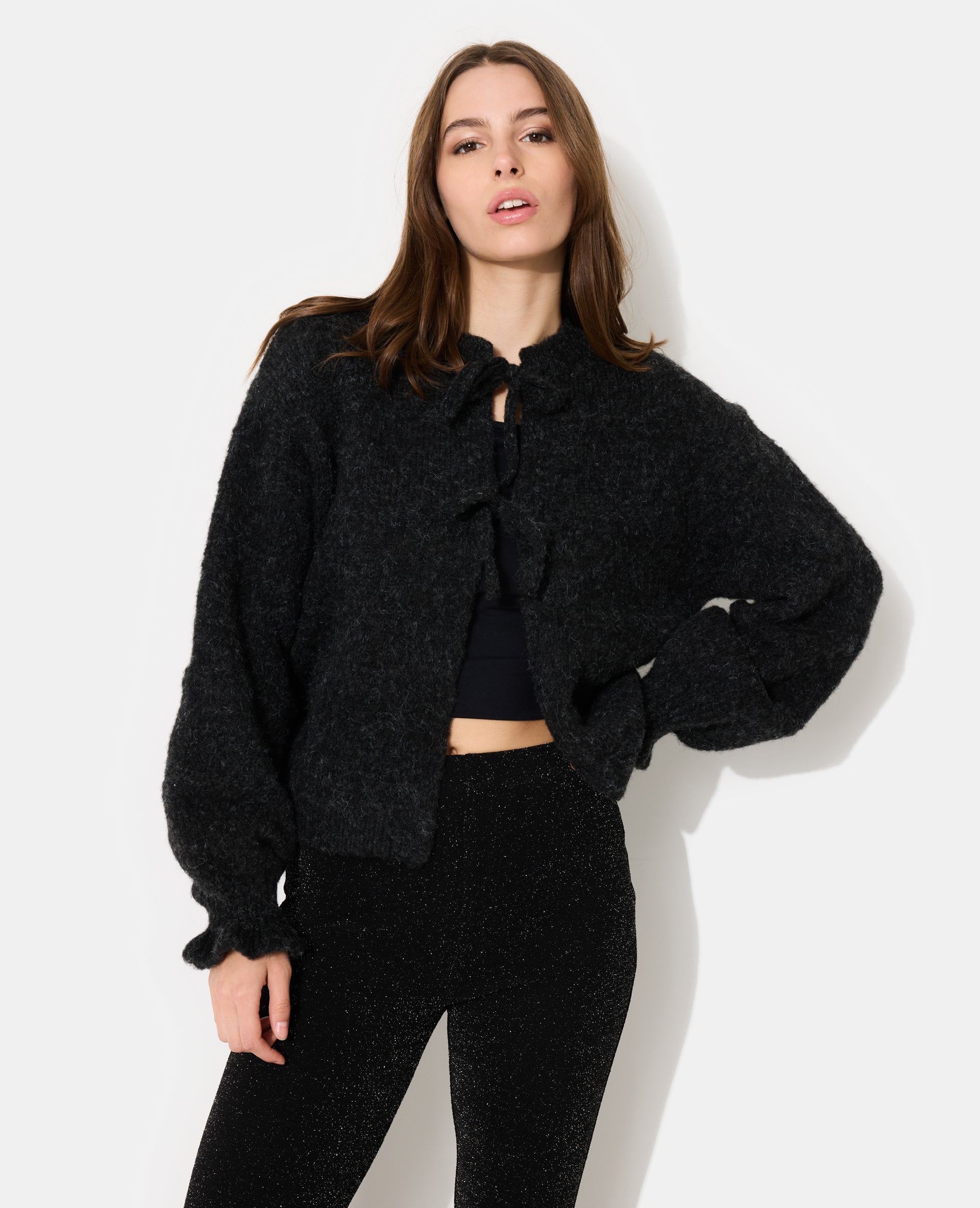 Gilet en maille fantaisie avec nouettes et volants