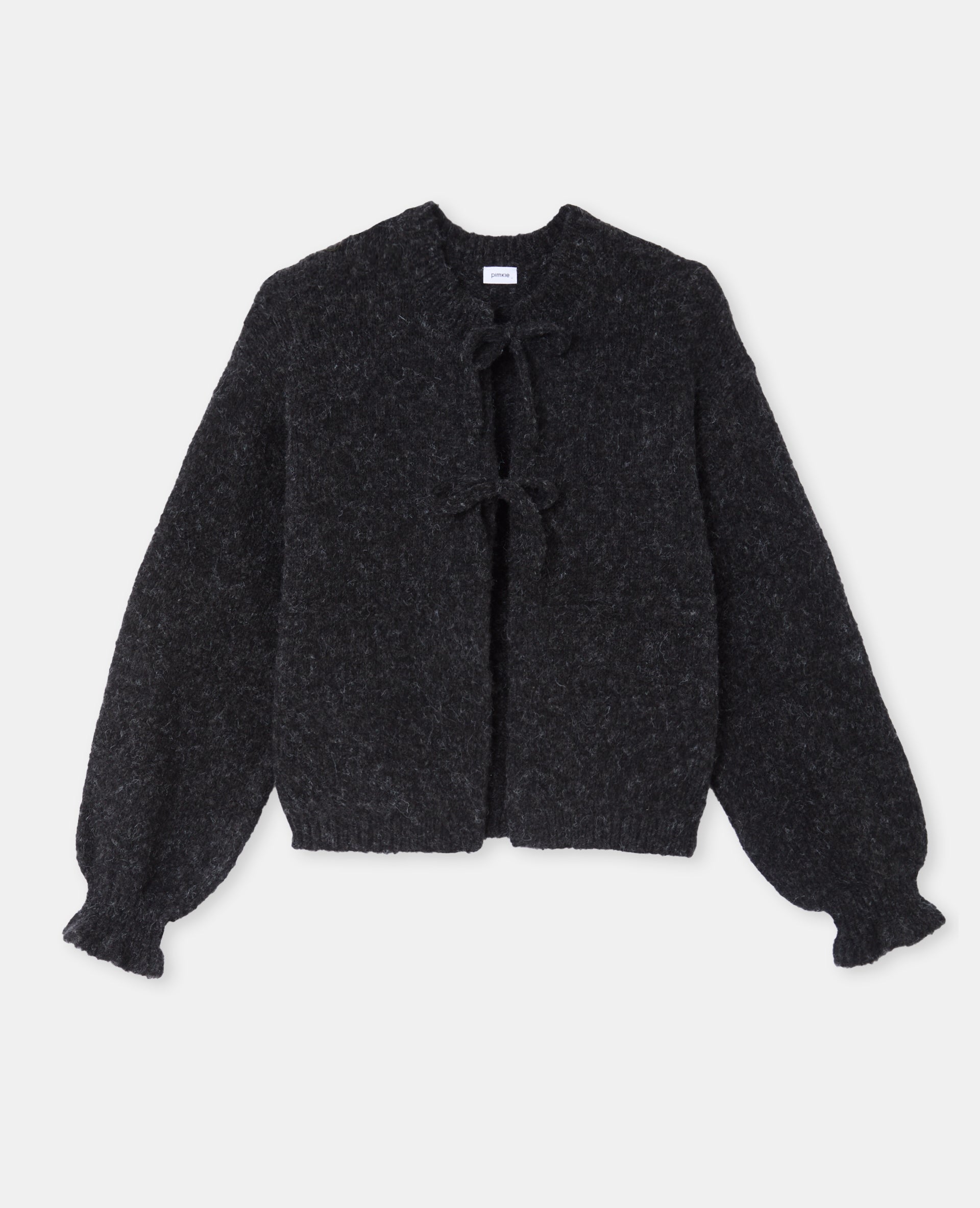 Gilet en maille fantaisie avec nouettes et volants