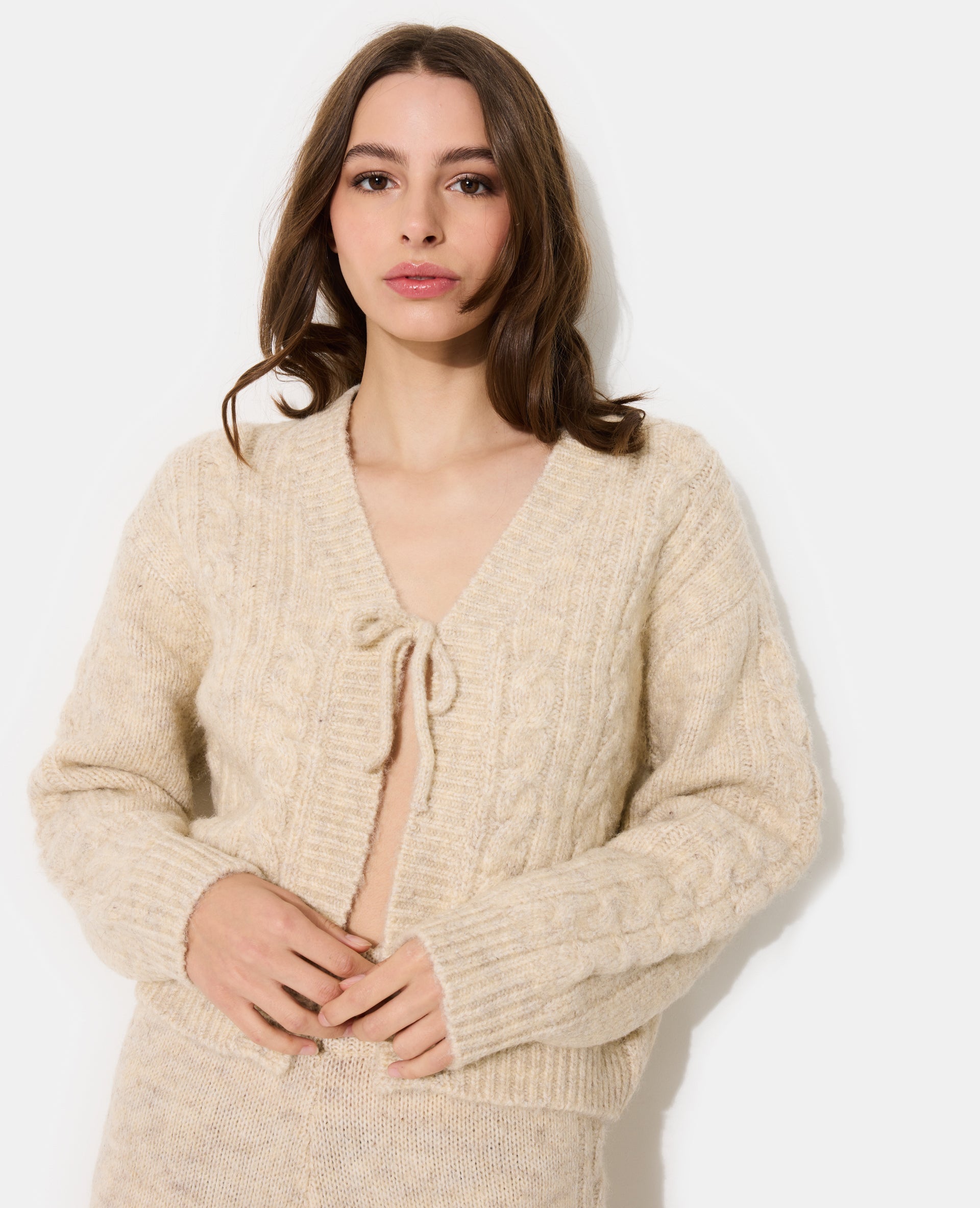 Gilet en maille torsadée avec nouette