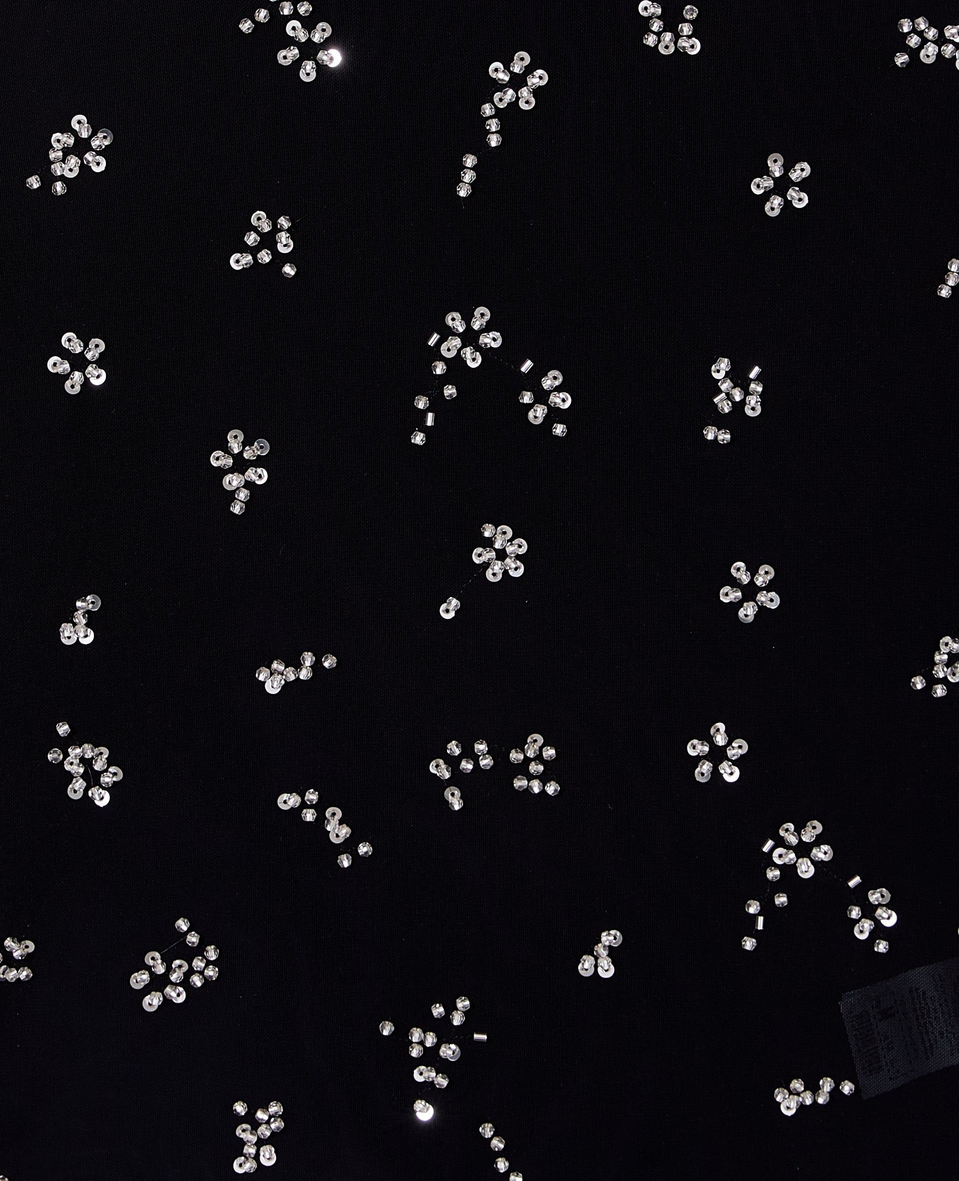 Top en résille avec perles et sequins