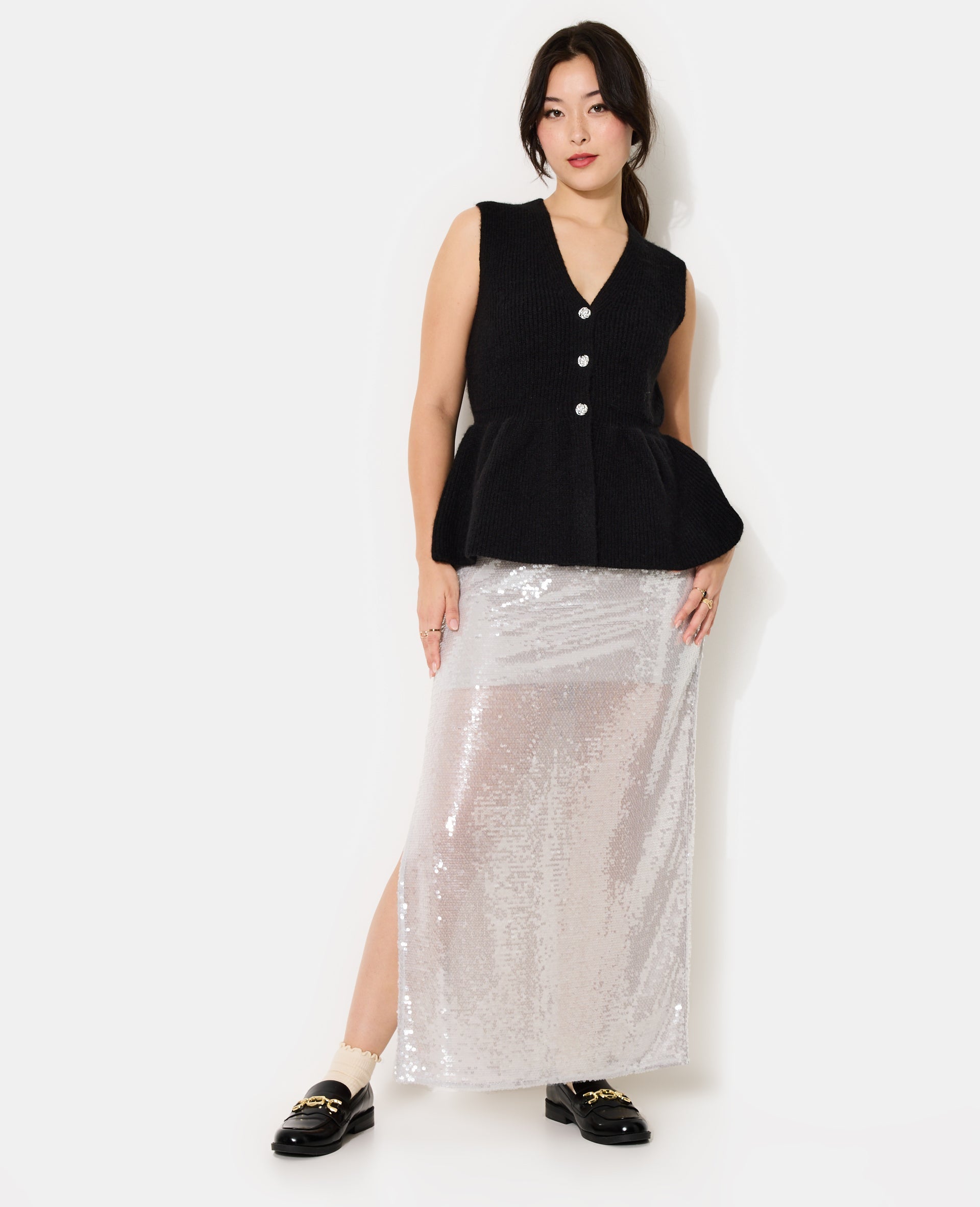 Gilet sans manches forme peplum