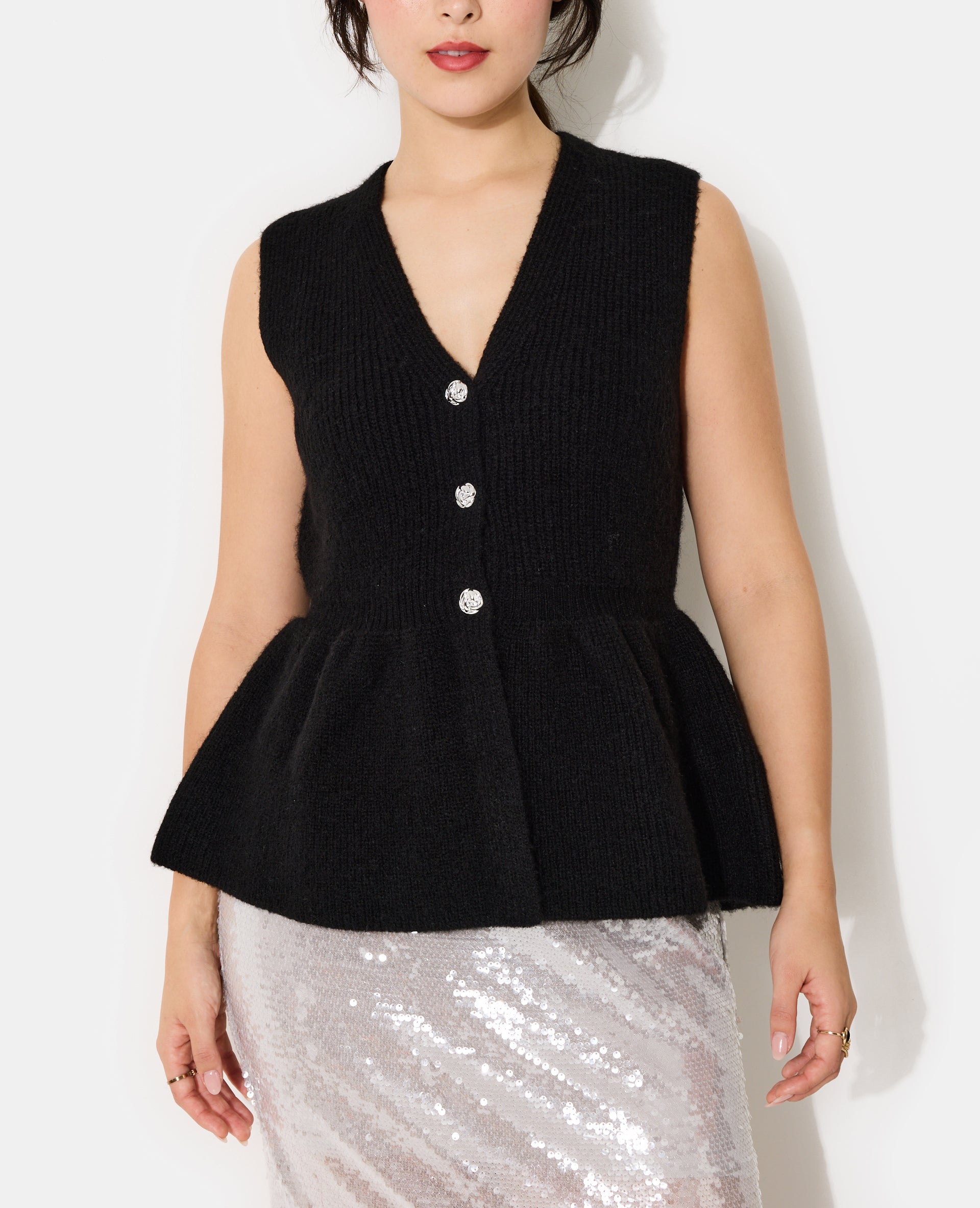 Gilet sans manches forme peplum