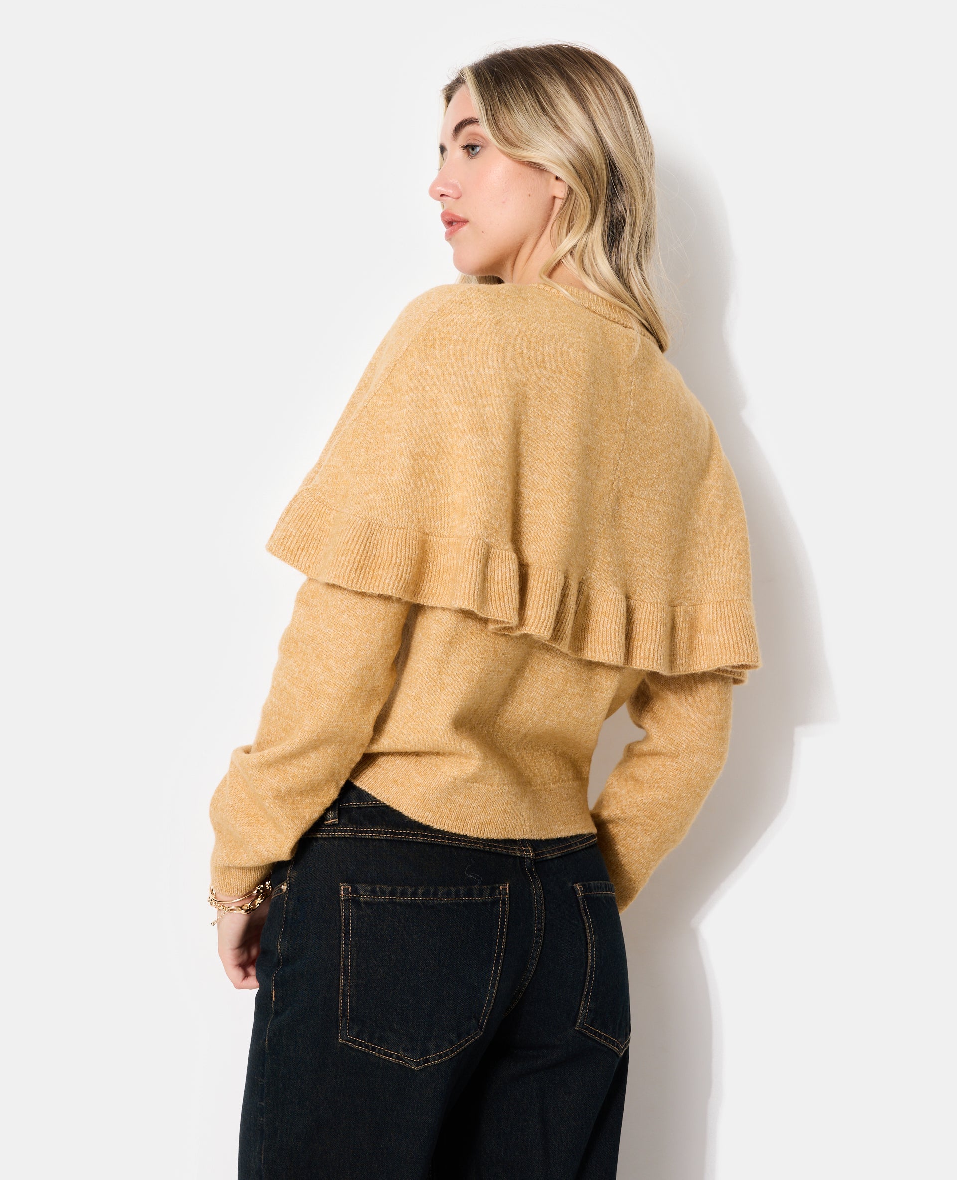 Gilet avec cape et boutons fantaisie