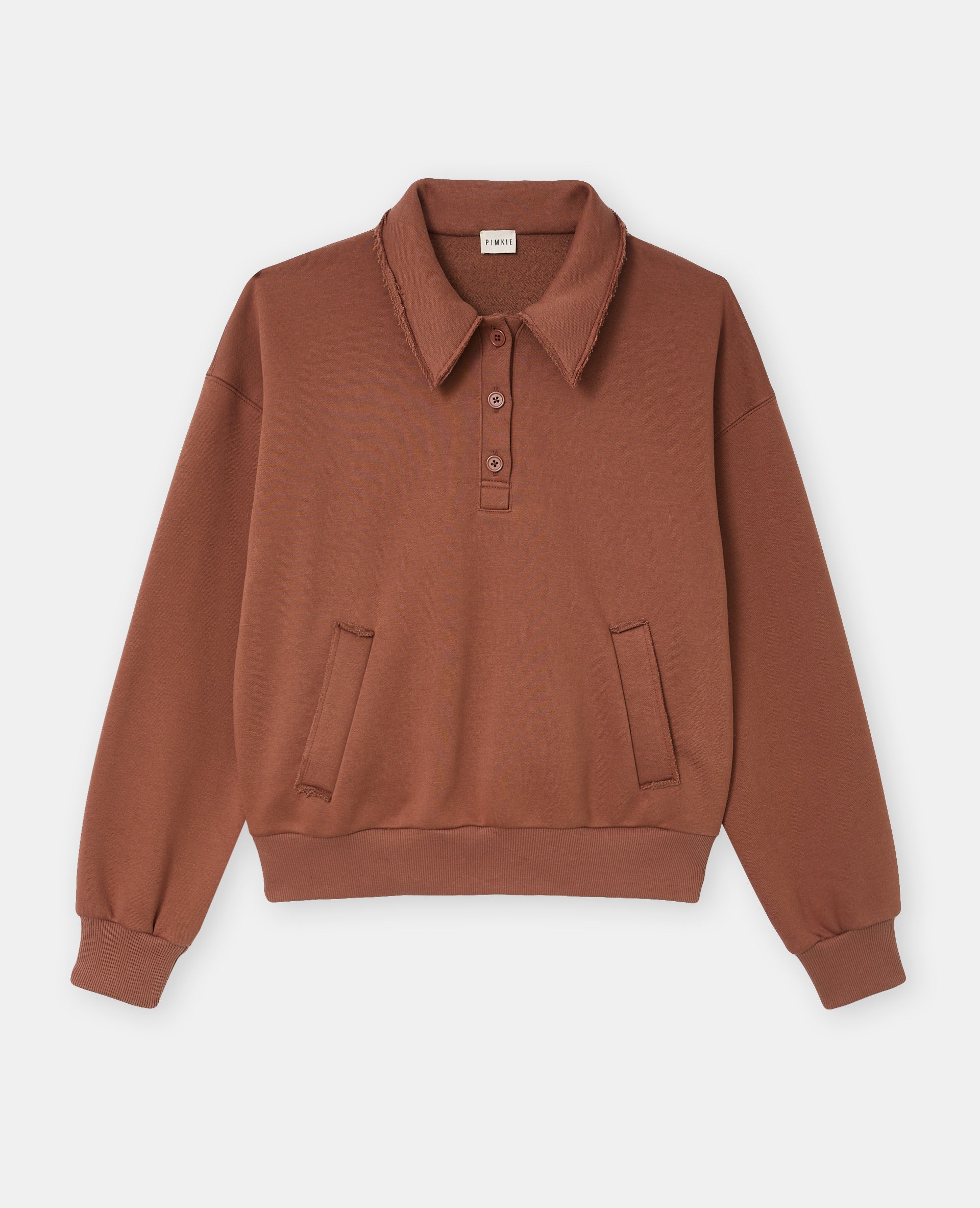 Sweat col polo avec poches et détails coupés