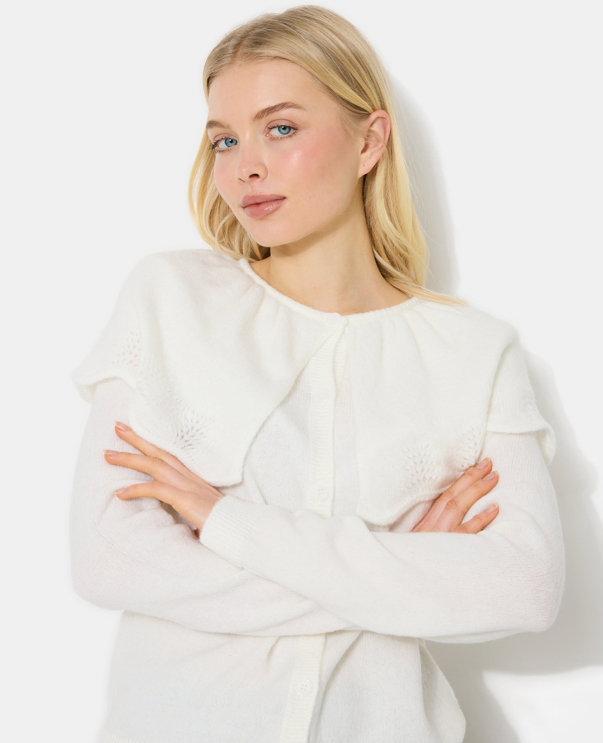 Gilet avec cape en maille ajourée