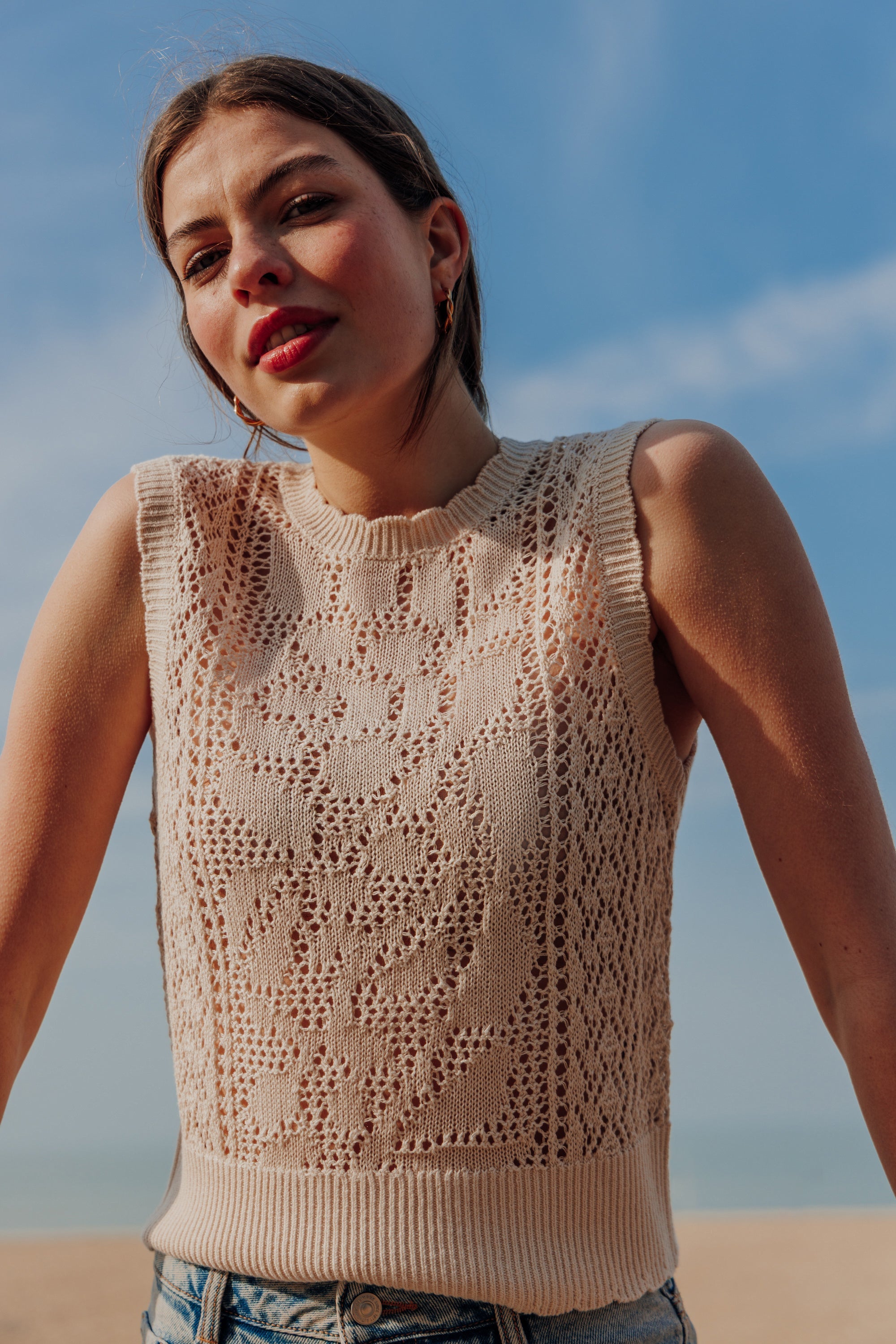 Pull sans manches en maille ajourée