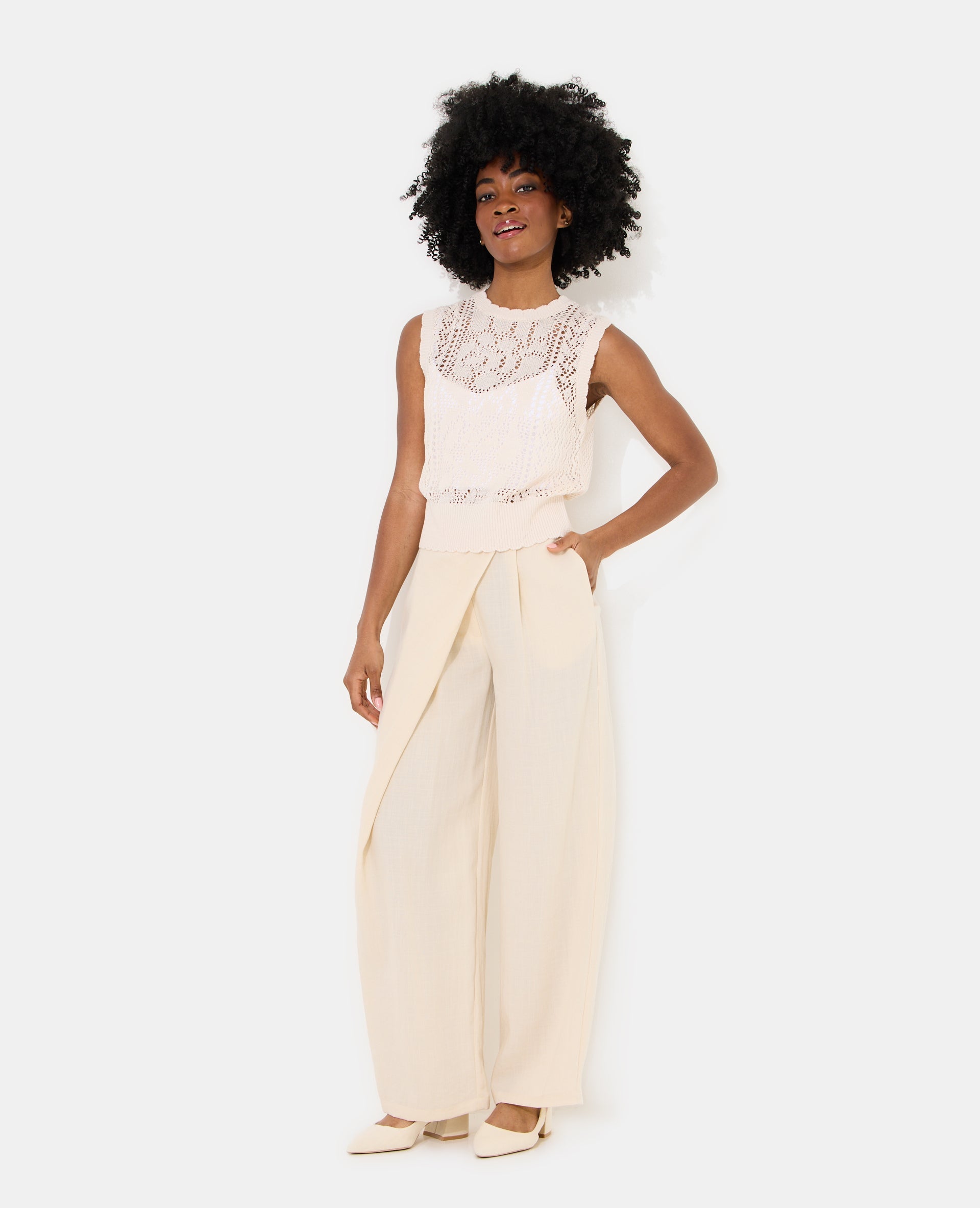 Pull sans manches en maille ajourée