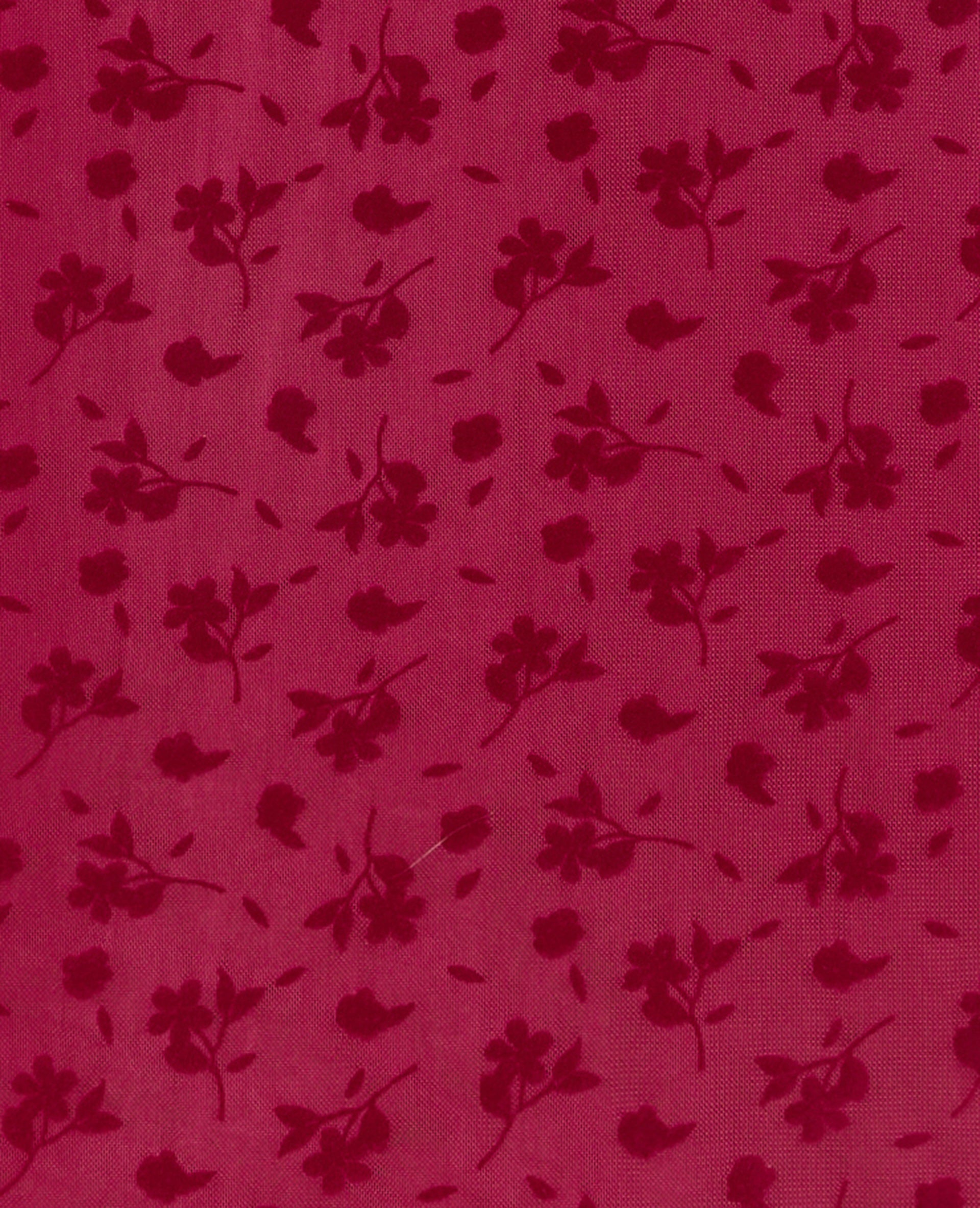 Top col mao en résille avec motif fleurs