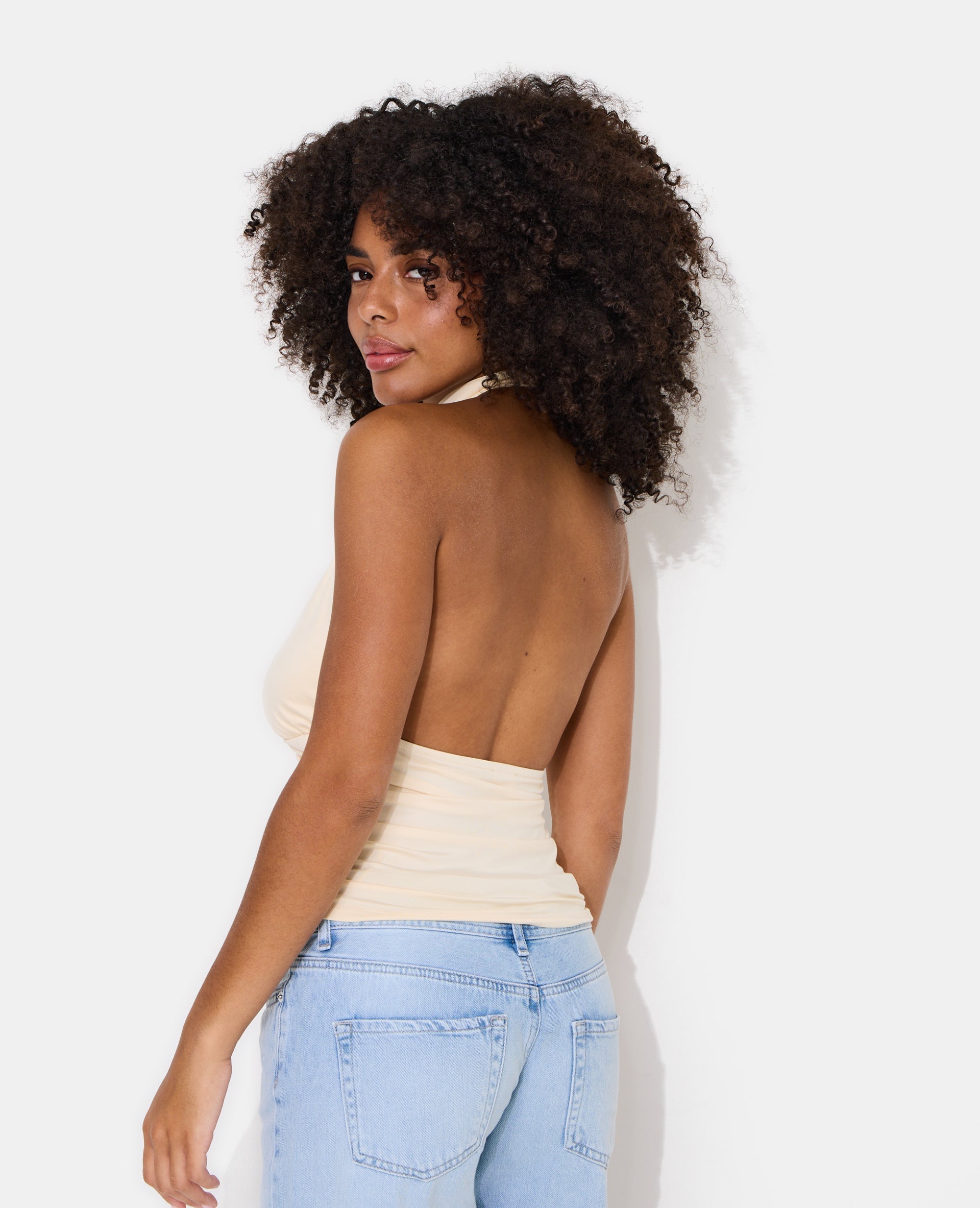 Top dos-nu avec détail boucle soleil