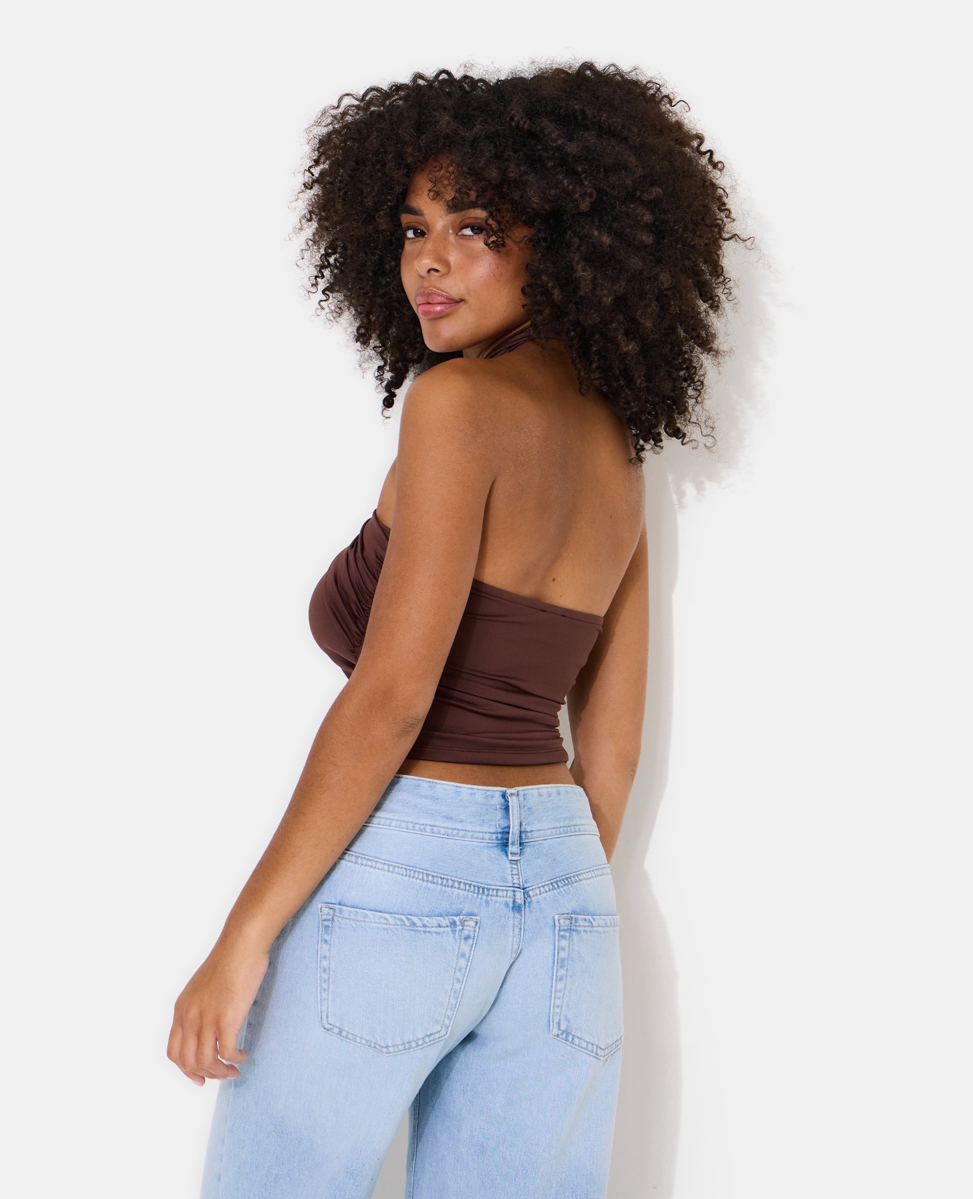 Top dos-nu effet croisé avec détail boucle soleil