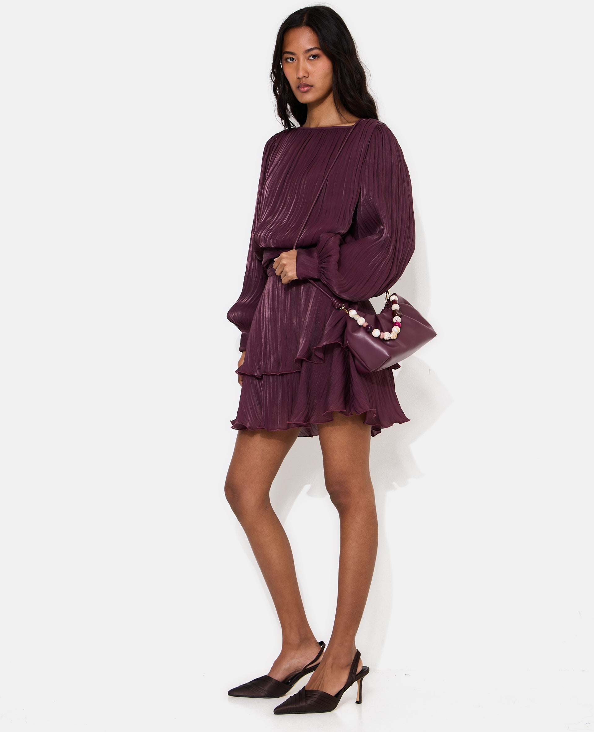 Robe en tissu brillant avec effet drapé