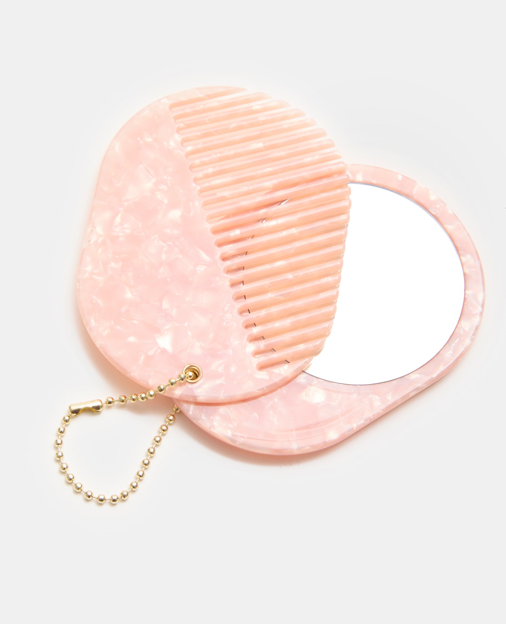 Déco de sac avec peigne et miroir