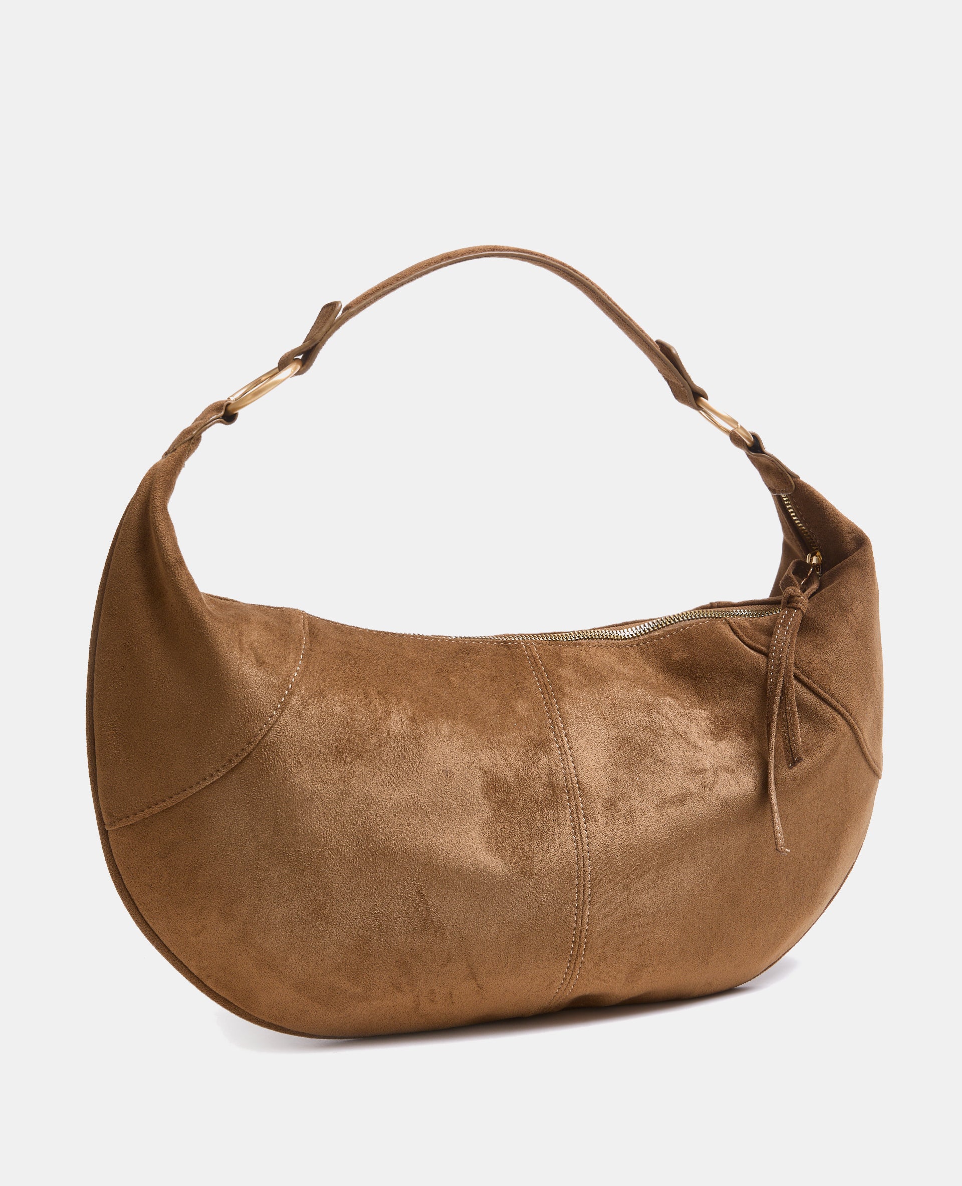 Sac demi-lune en suédine souple porté épaule