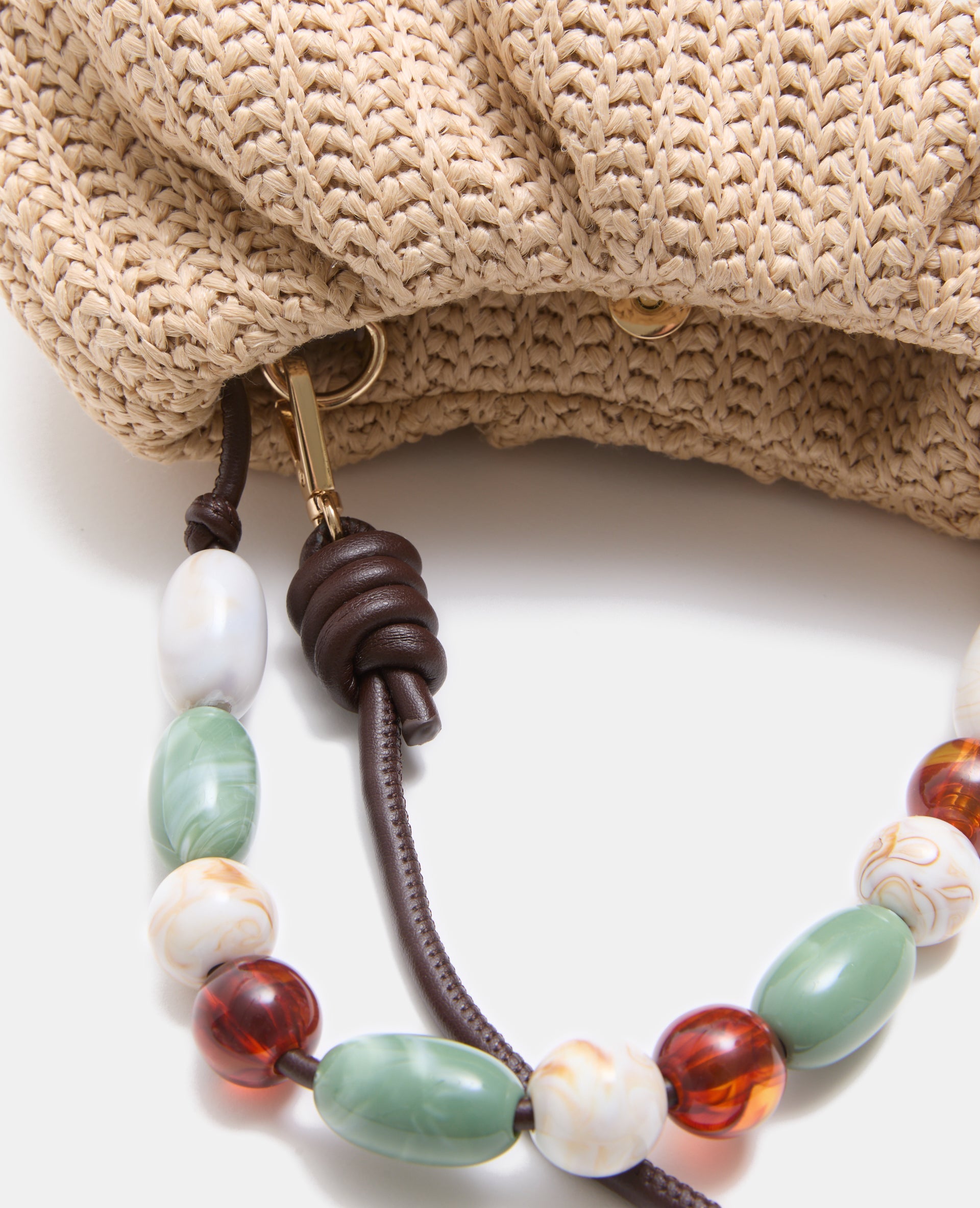 Sac en raphia avec poignée perles et bandoulière